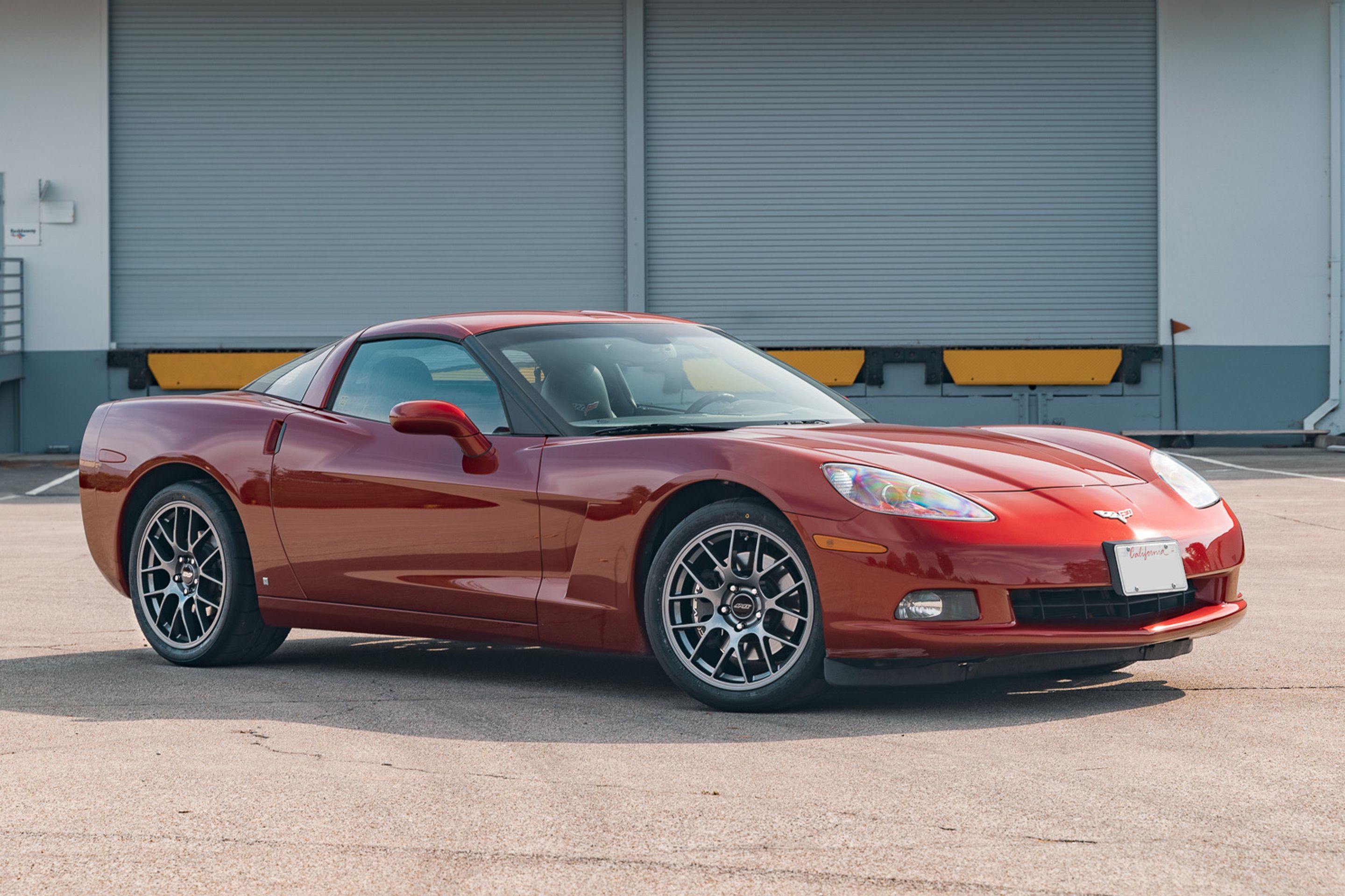 Red Chevrolet C6 Corvette Base/Z51 with 18"/19" EC-7 Apex wheels in Anthracite