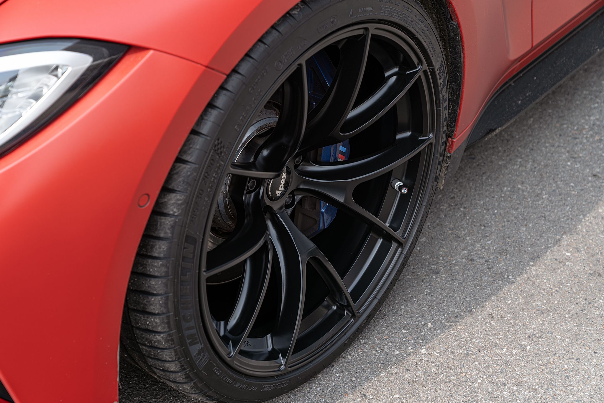 Red BMW G80 M3 with 20" VS-5RS Apex wheels in Satin Black