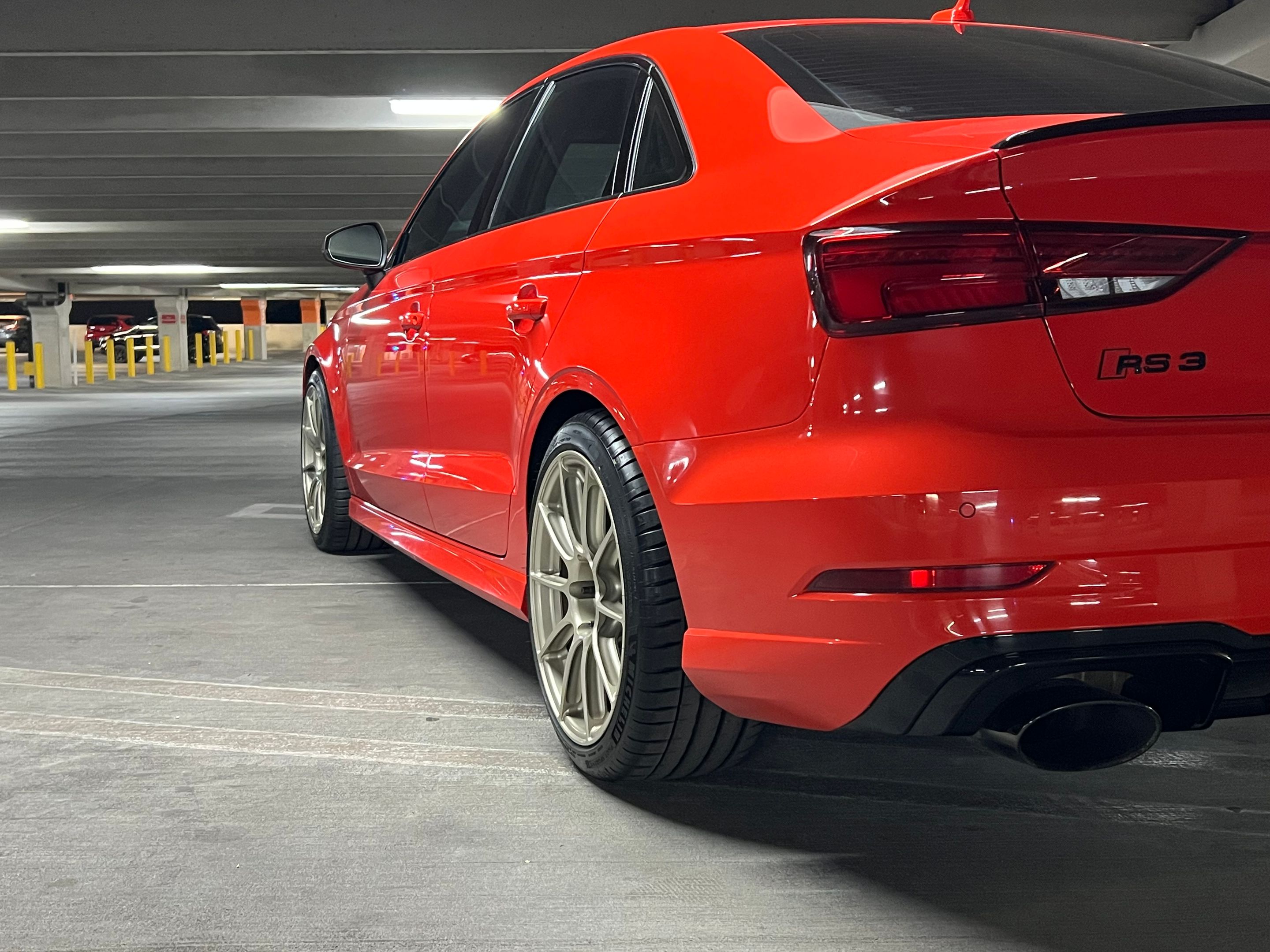 Red Audi 8V RS 3 with 18" SM-10RS Apex wheels in Motorsport Gold
