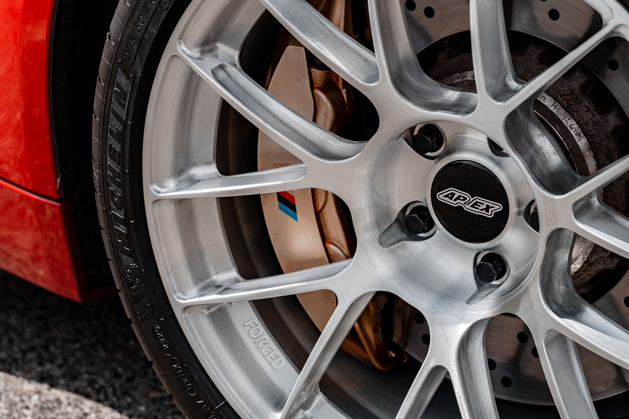 Red BMW F82 Coupe M4 with 19" EC-7RS Apex wheels in Brushed Clear