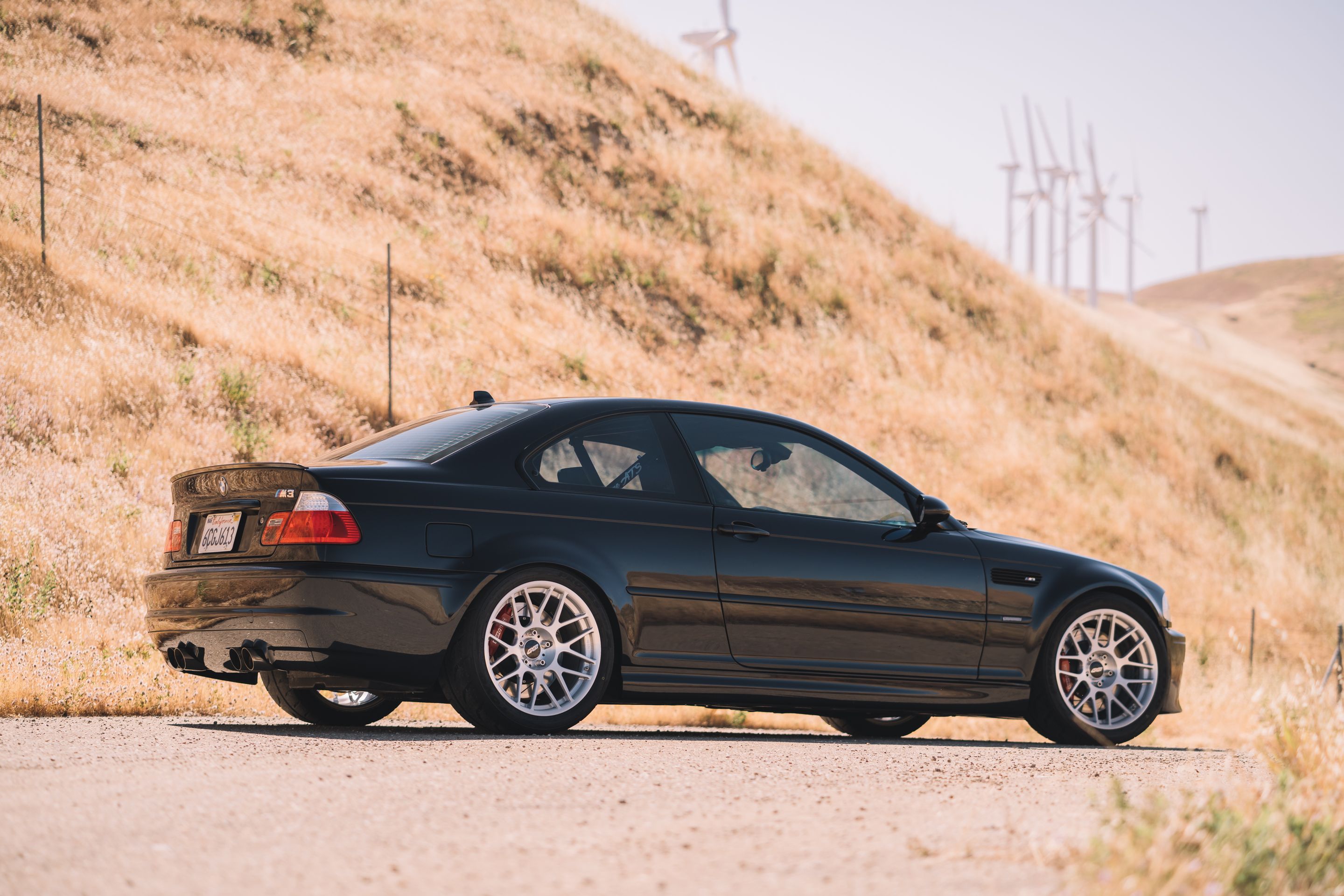 Black BMW E46 M3 with 18" ARC-8R Apex wheels in Brushed Clear