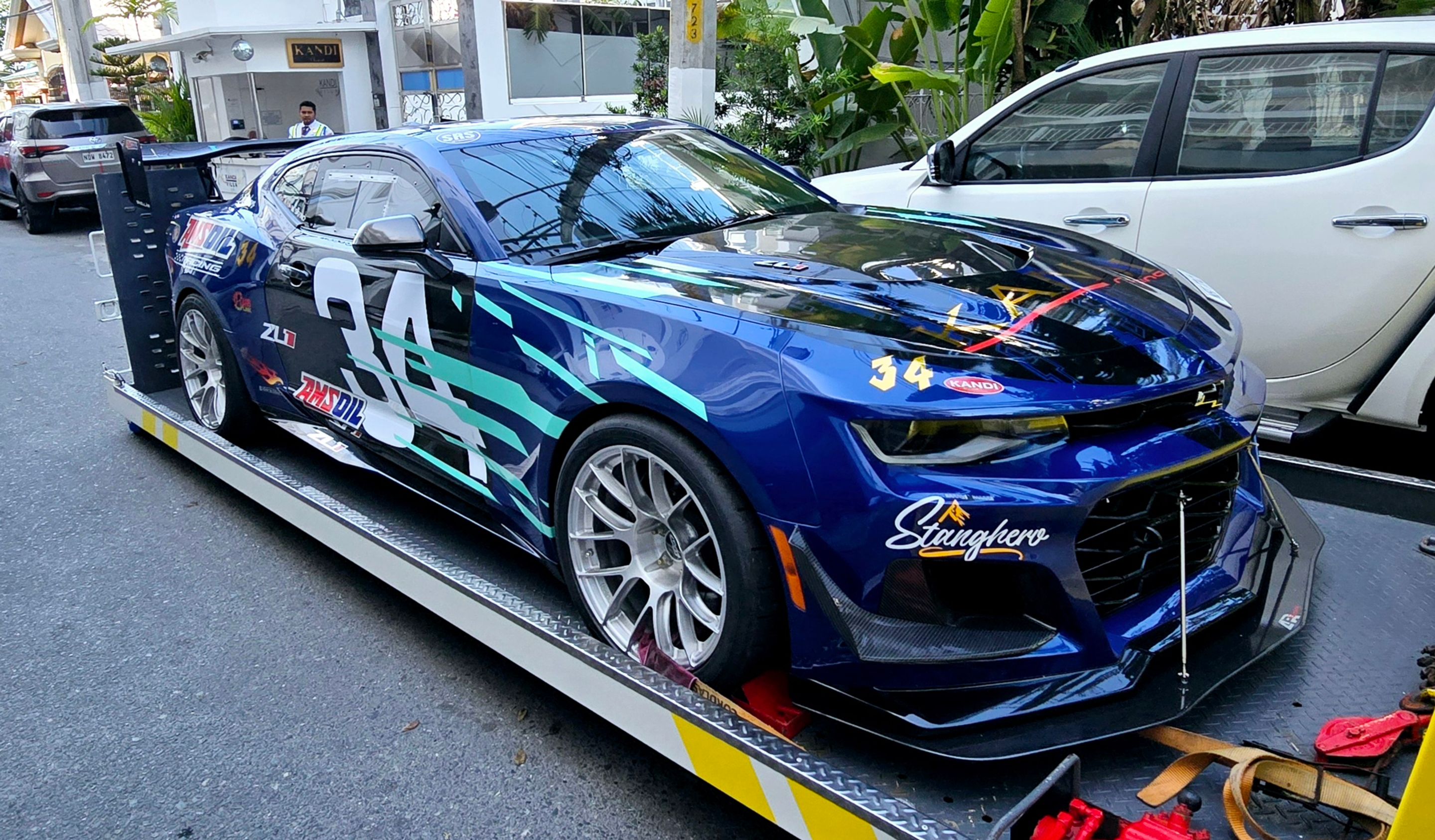 Blue Chevrolet 6th Gen Camaro ZL1 with 19" EC-7RS Apex wheels in Brushed Clear