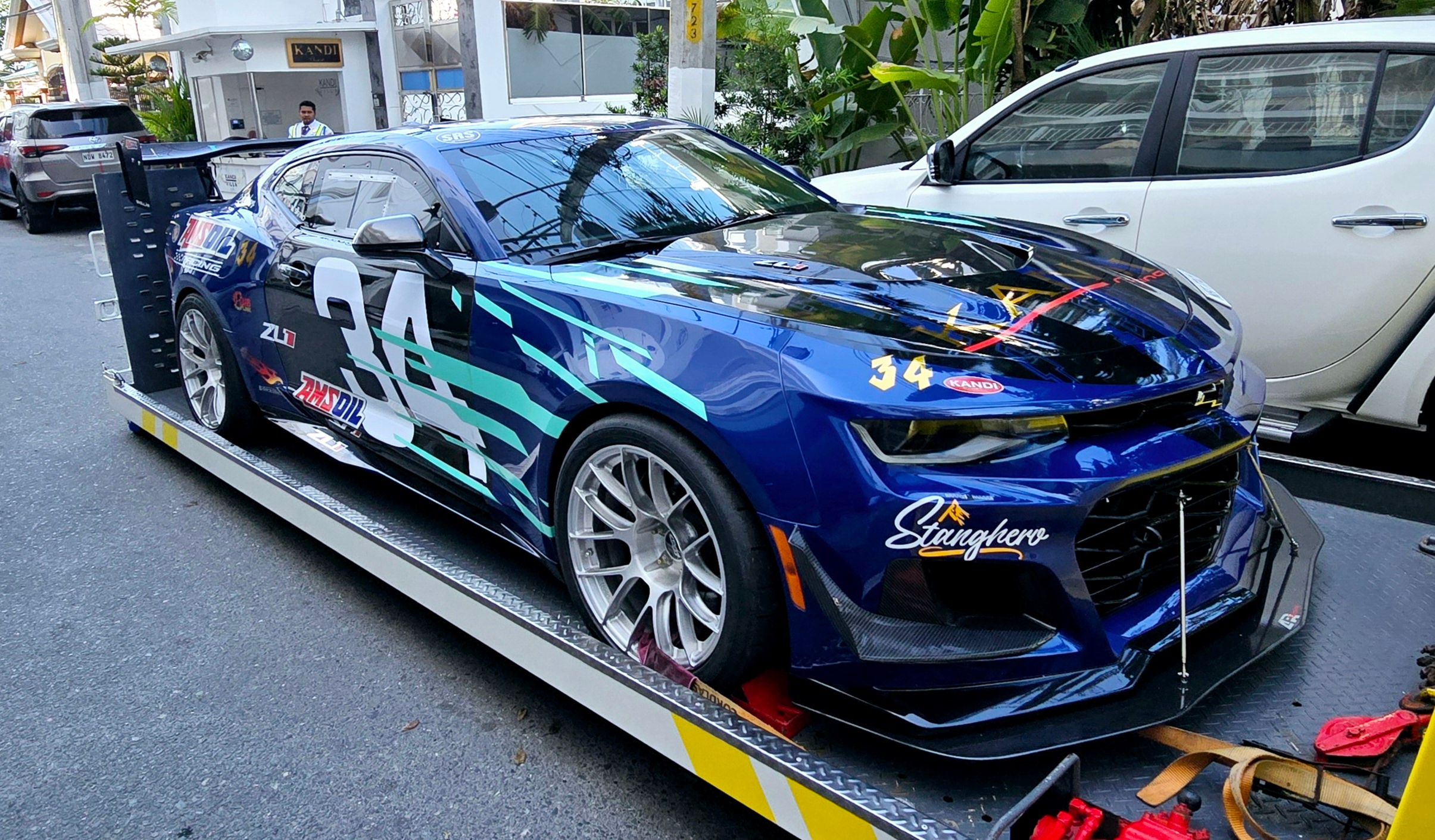 Blue Chevrolet 6th Gen Camaro ZL1 with 19" EC-7RS Apex wheels in Brushed Clear