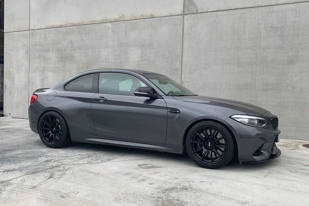 Grey BMW F87 M2 with 18" SM-10 Apex wheels in Satin Black