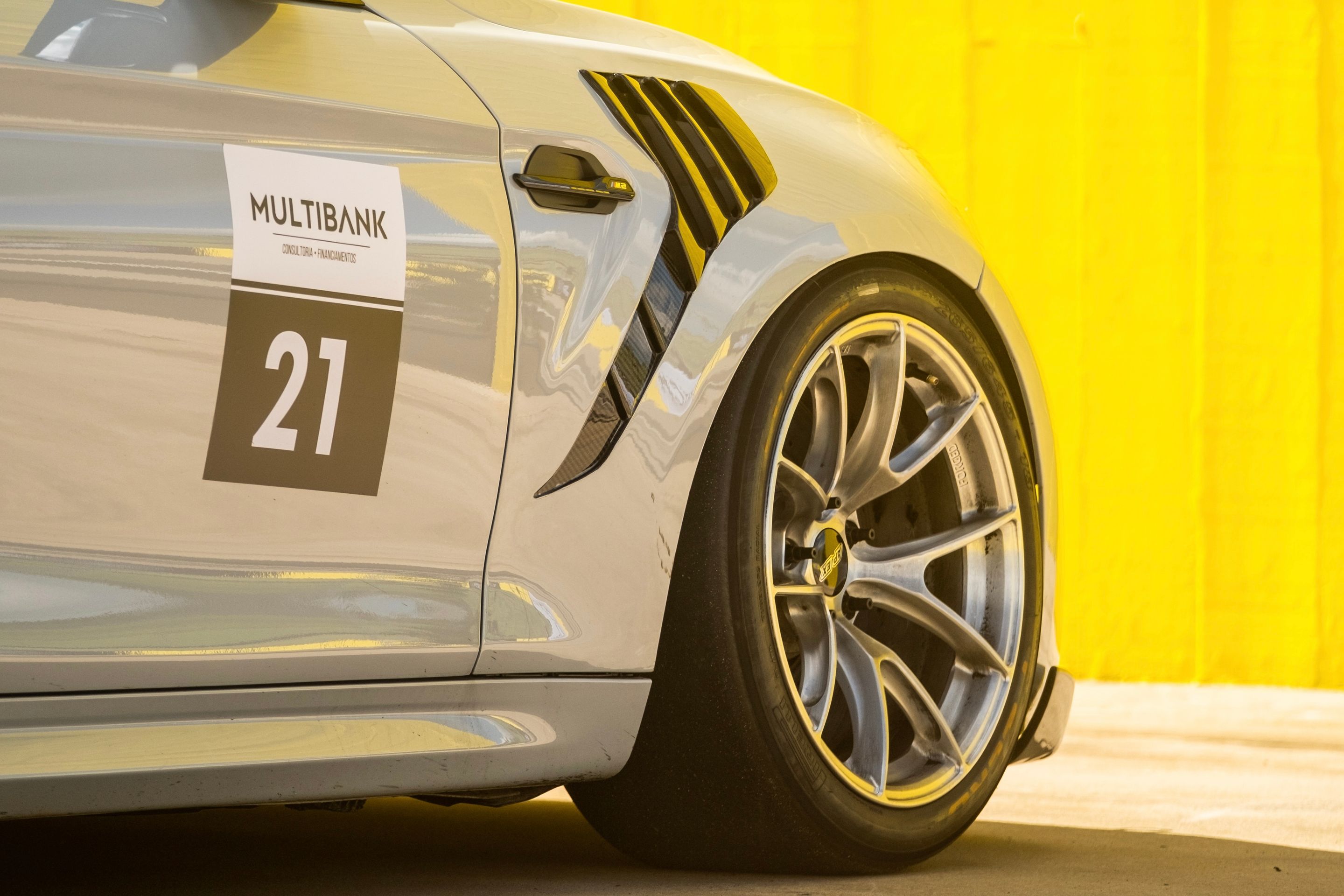 Silver BMW F87 M2 with 18" VS-5RS Apex wheels in Brushed Clear