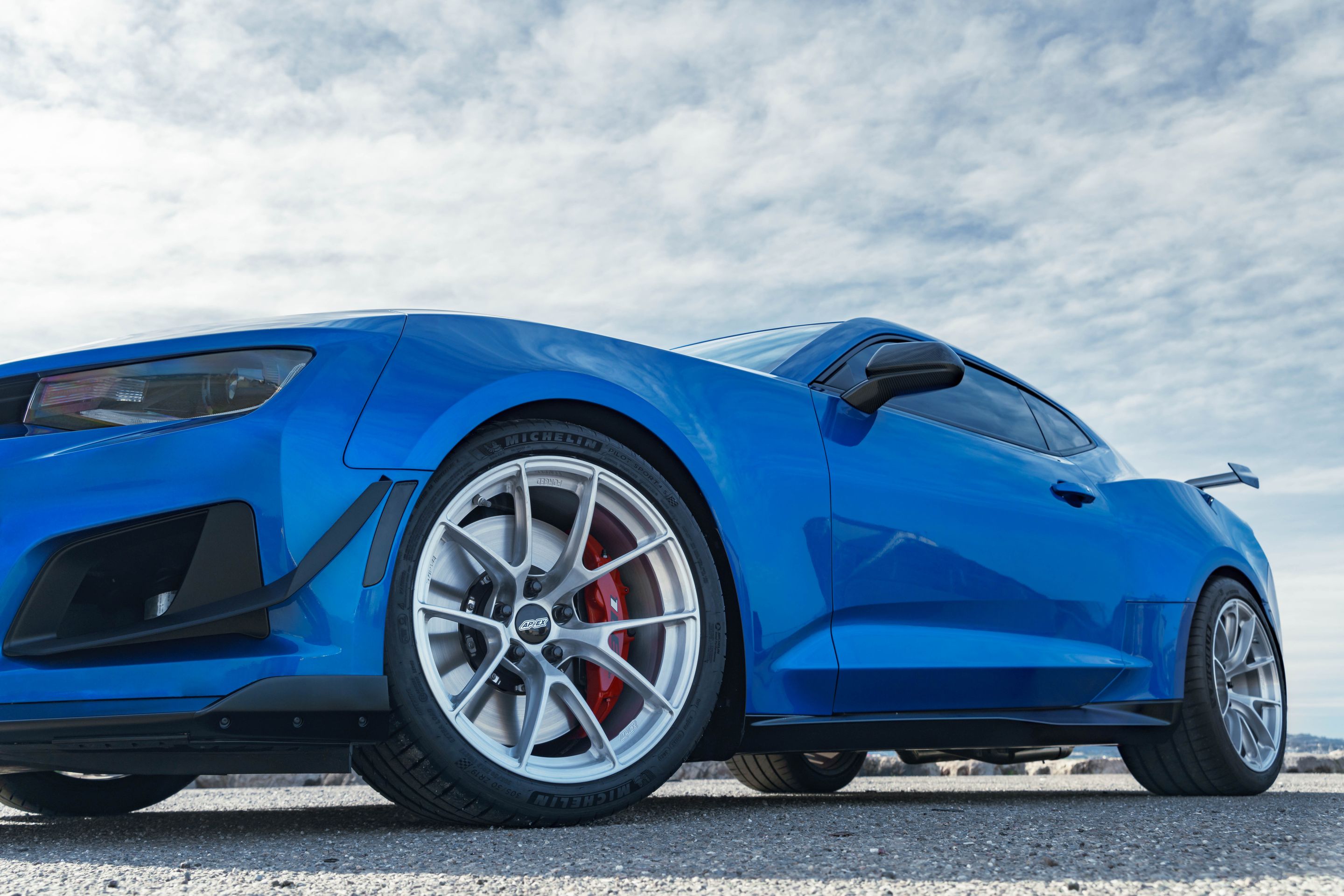 Blue Chevrolet 6th Gen Camaro ZL1 1LE with 19" VS-5RS Apex wheels in Brushed Clear