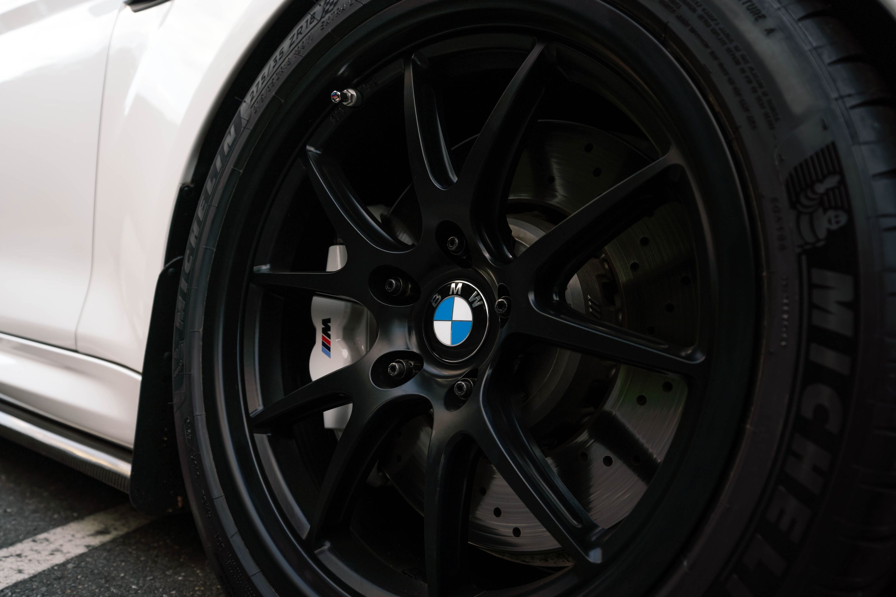 White BMW F87 M2 with 18" FL-5 Apex wheels in Satin Black