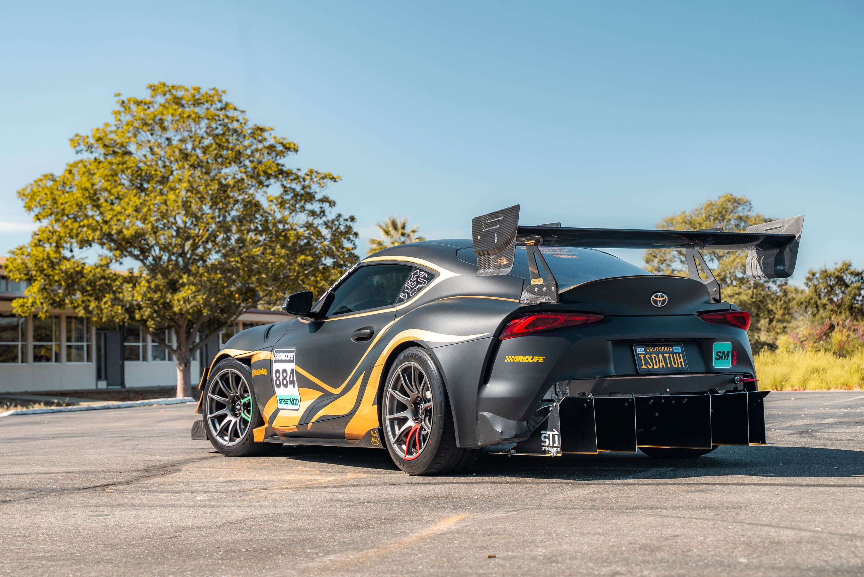 Grey Toyota GR Supra with 18" SM-10 Apex wheels in Anthracite