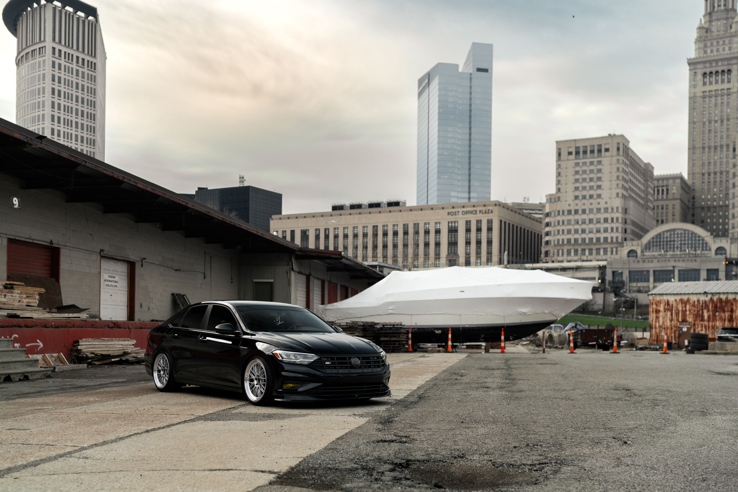 Black VW MK7 Jetta with 19" ML-10RT Apex wheels in Machined Lip Race Silver