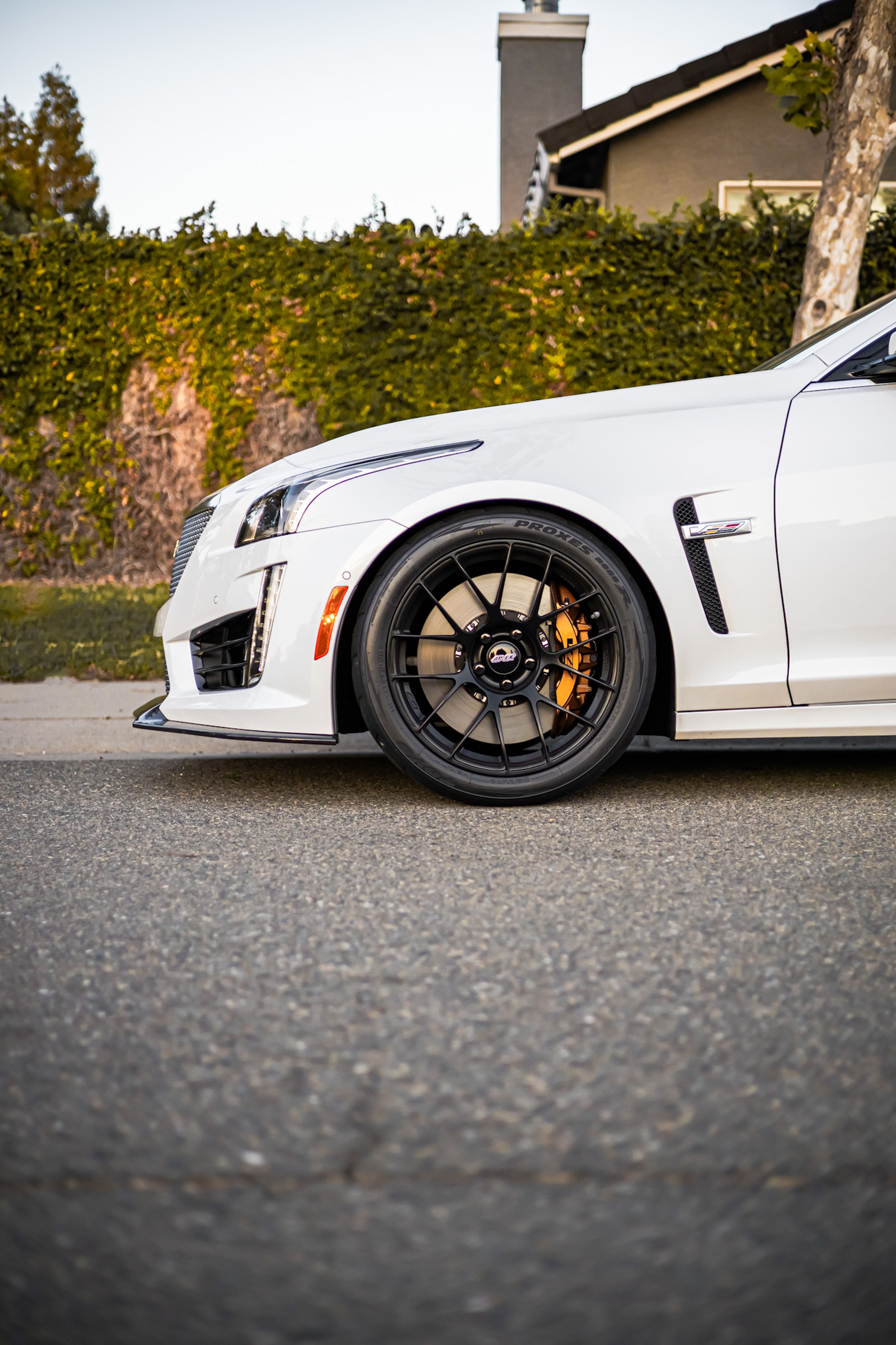 White Cadillac Gen 3 CTS-V with 19" EC-7RS Apex wheels in Satin Black