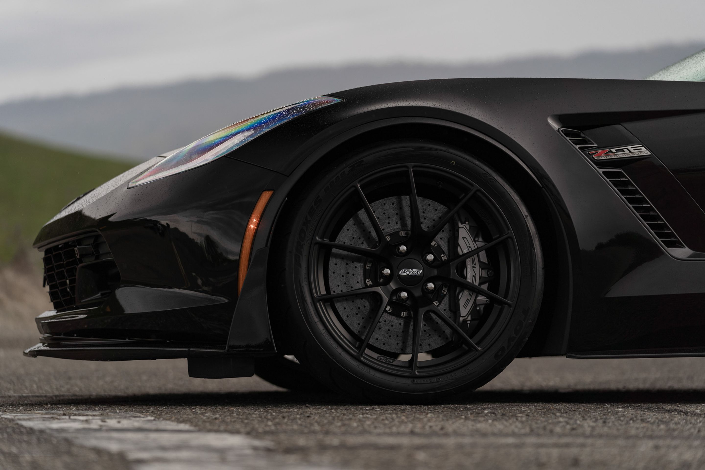 Black Chevrolet C7 Corvette Z06 with 19" VS-5RS Apex wheels in Satin Black
