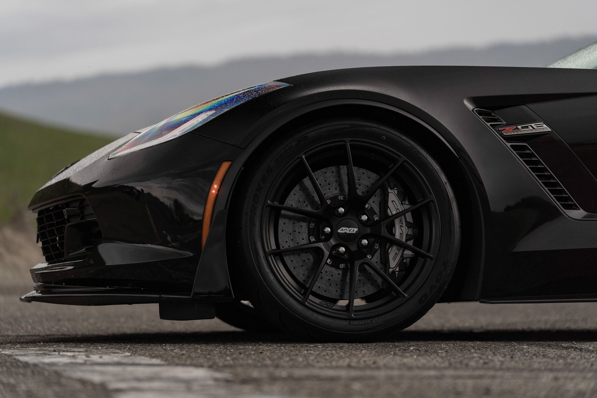Black Chevrolet C7 Corvette Z06 with 19" VS-5RS Apex wheels in Satin Black