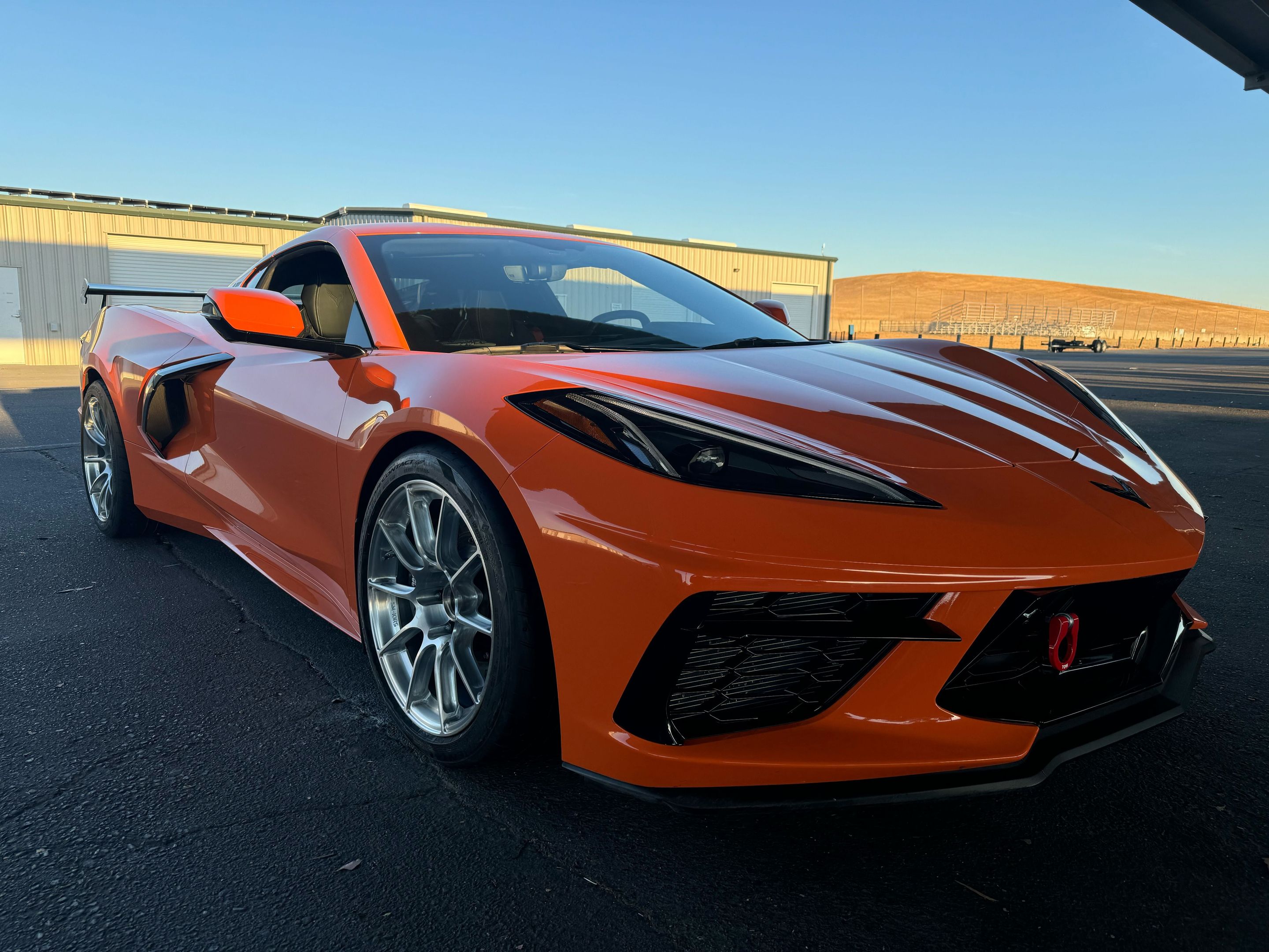 Orange Chevrolet C8 Corvette Stingray/Z51 with 18"/19" SM-10RS Apex wheels in Brushed Clear