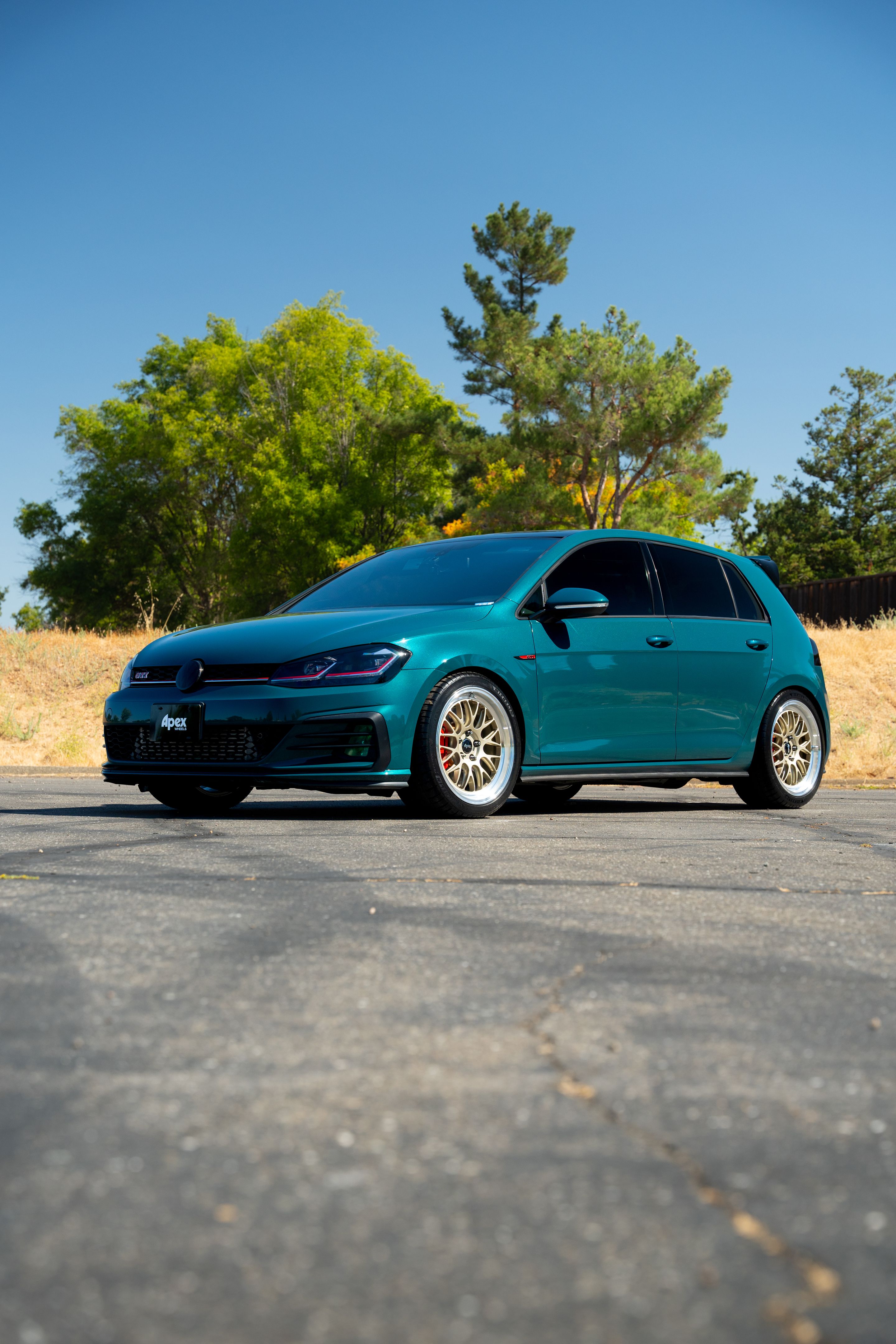 Green VW MK7 GTI with 18" ML-10RT Apex wheels in Machined Lip Gloss Motorsport Gold