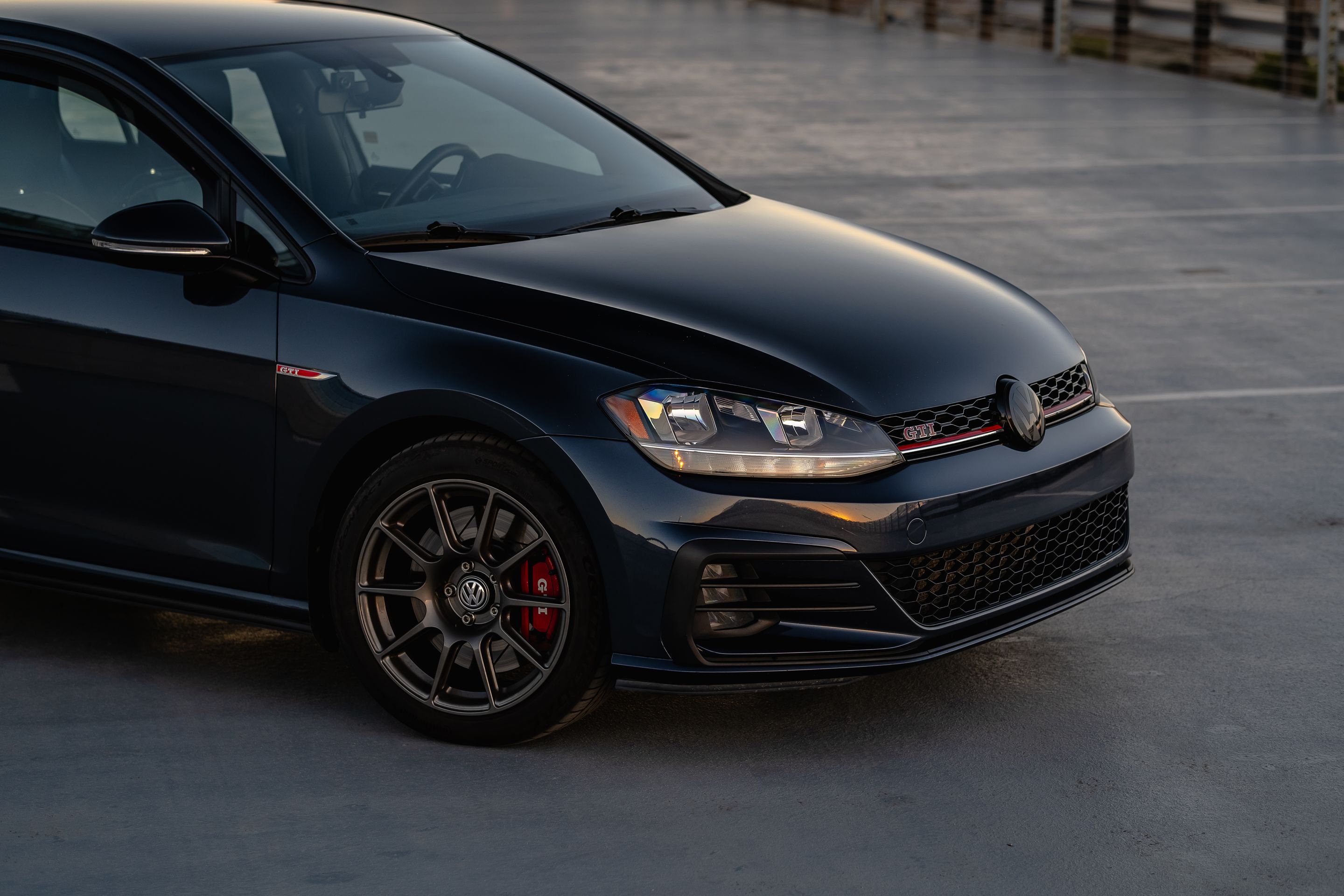 Black VW MK7 GTI with 17" SM-10 Apex wheels in Anthracite