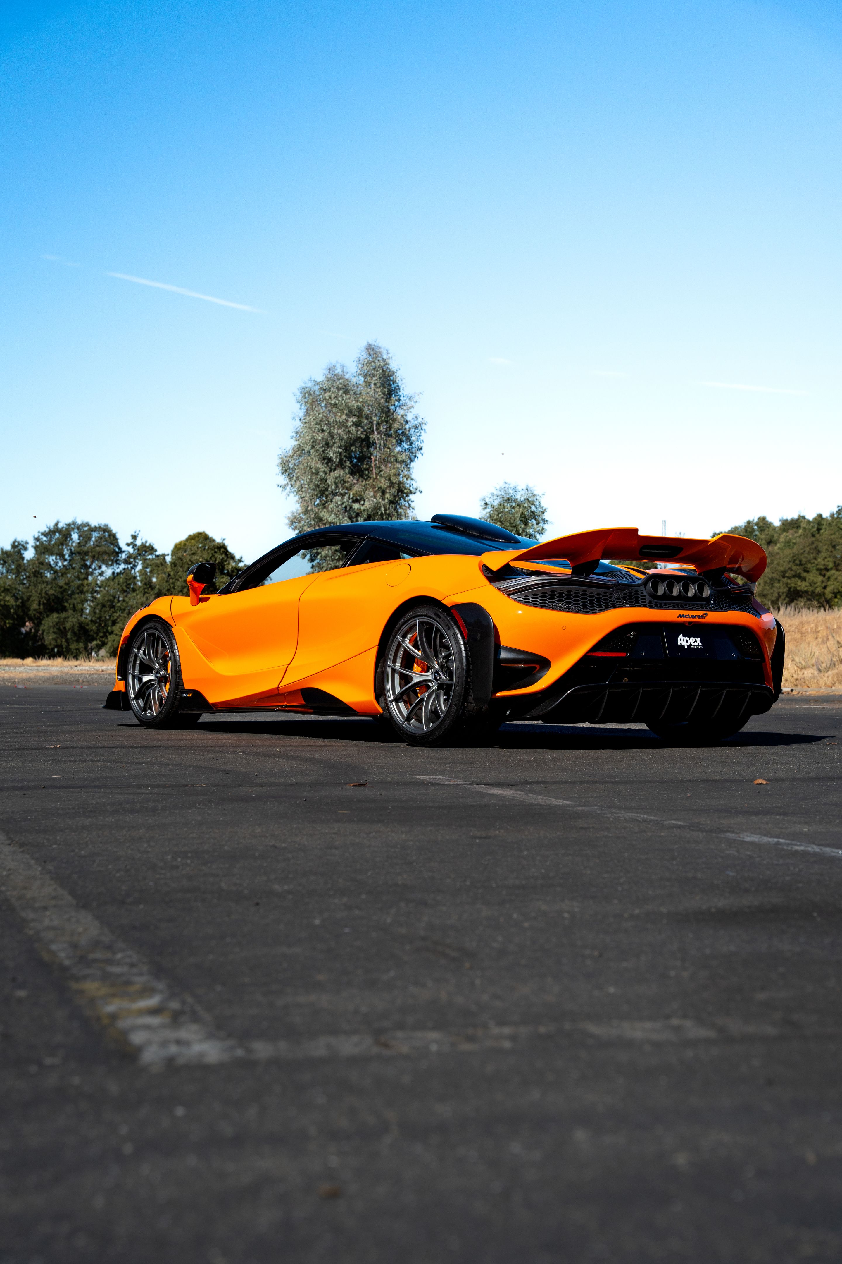 Orange McLaren 765LT with 19"/20" VS-5RS Apex wheels in Anthracite
