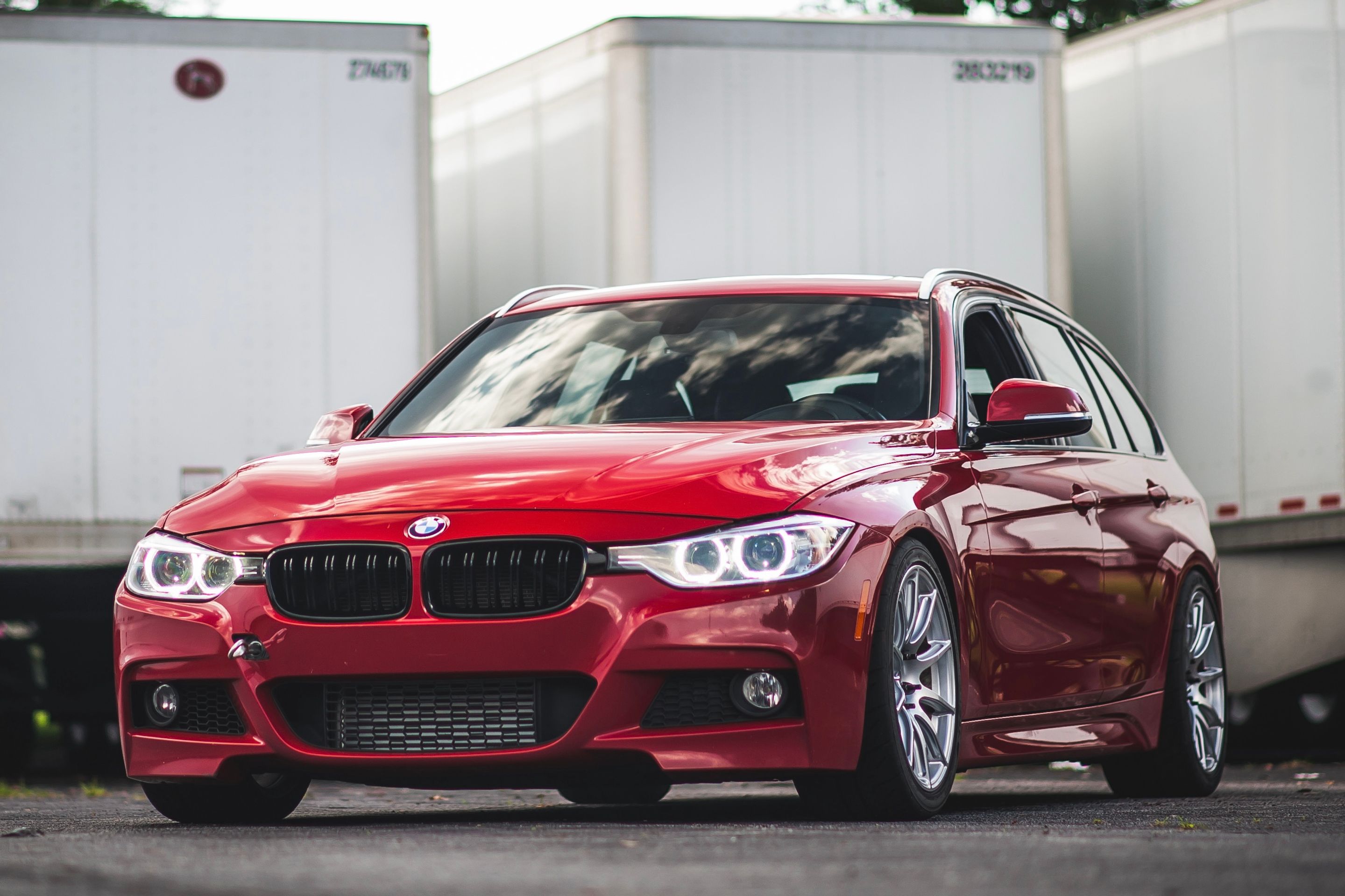 Red BMW F31 Wagon 3 Series with 18" SM-10 Apex wheels in Race Silver