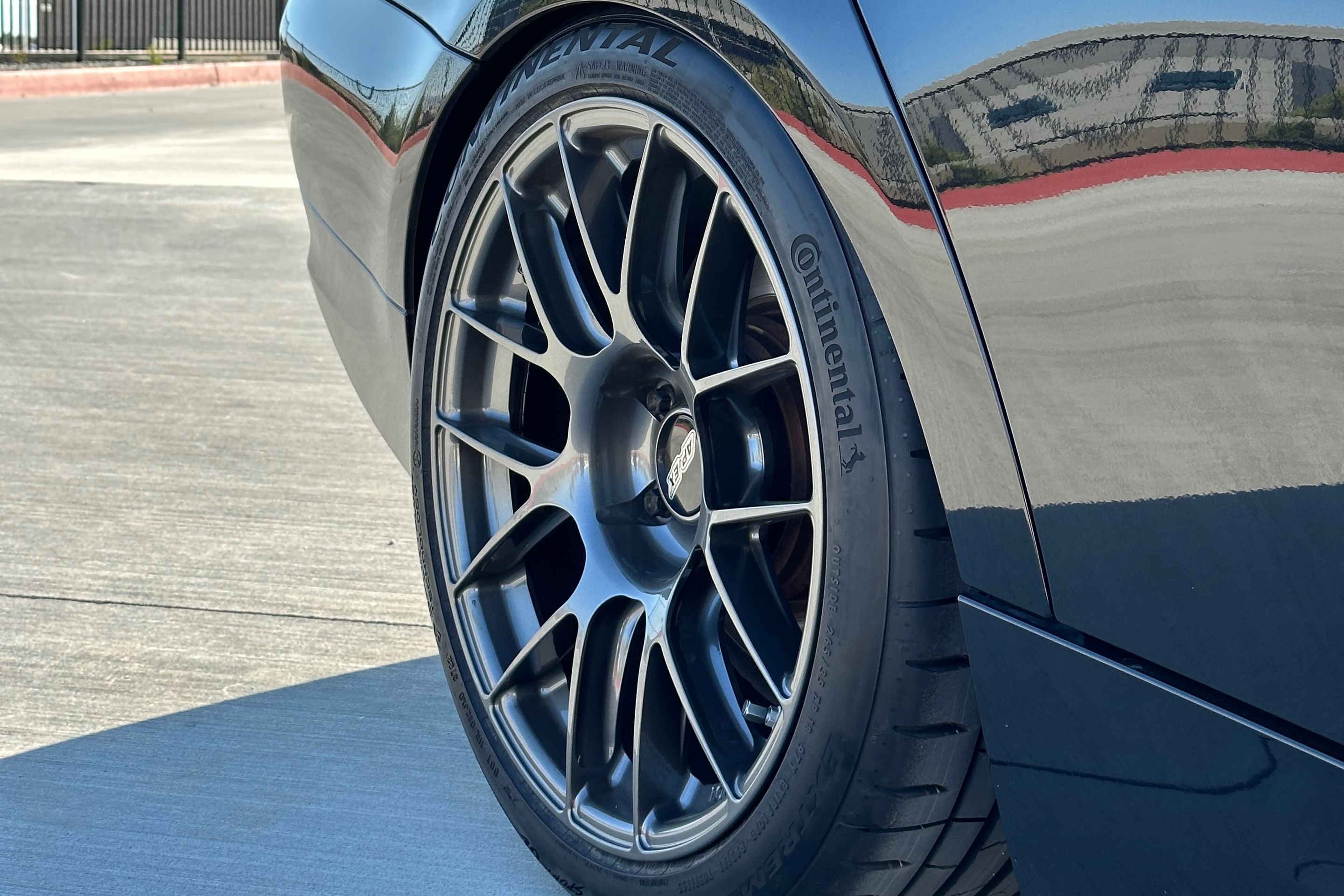 Grey BMW E91 Wagon 3 Series with 18" EC-7RS Apex wheels in Anthracite