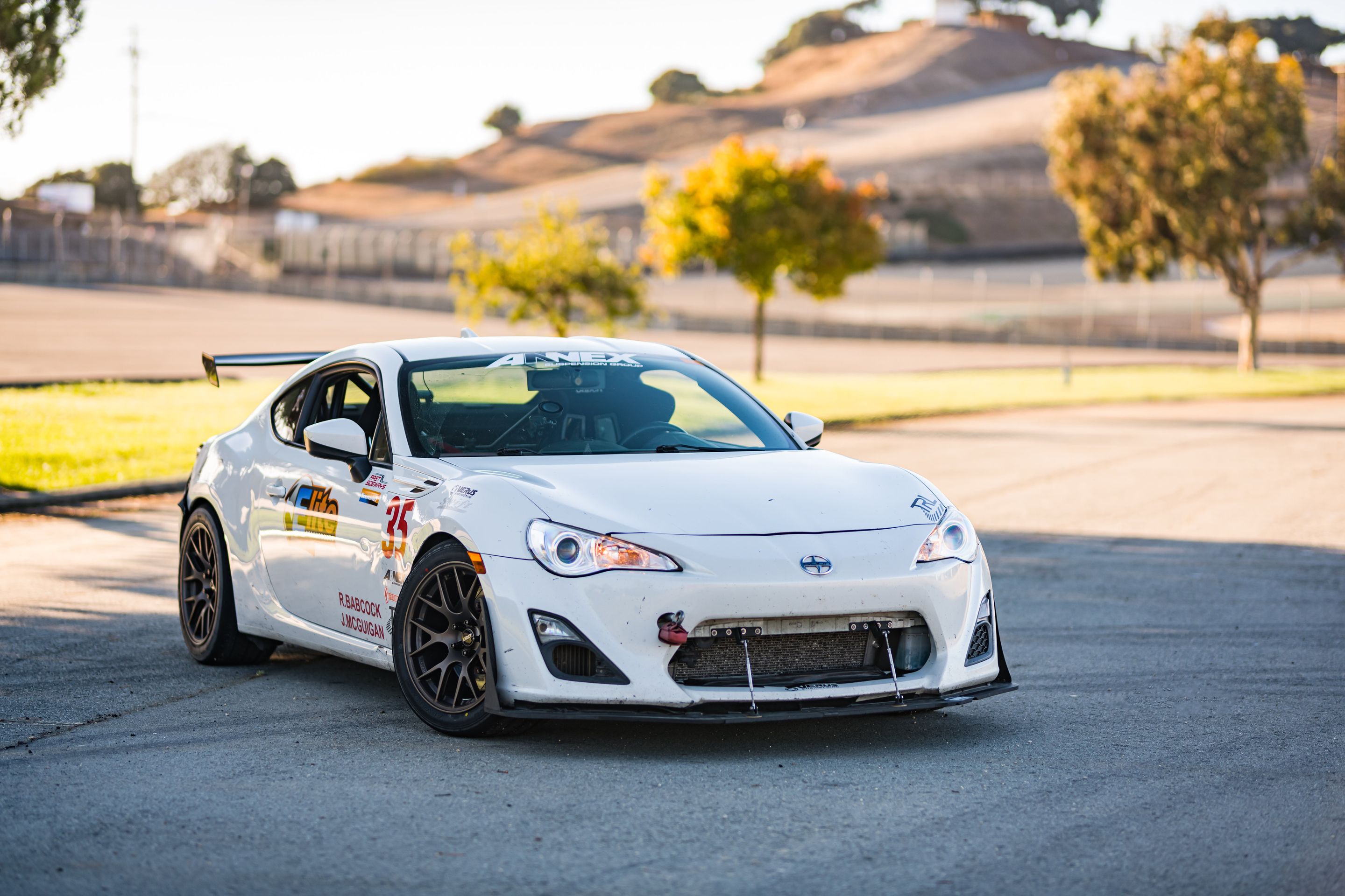 White Scion FR-S with 17" EC-7R Apex wheels in Satin Bronze