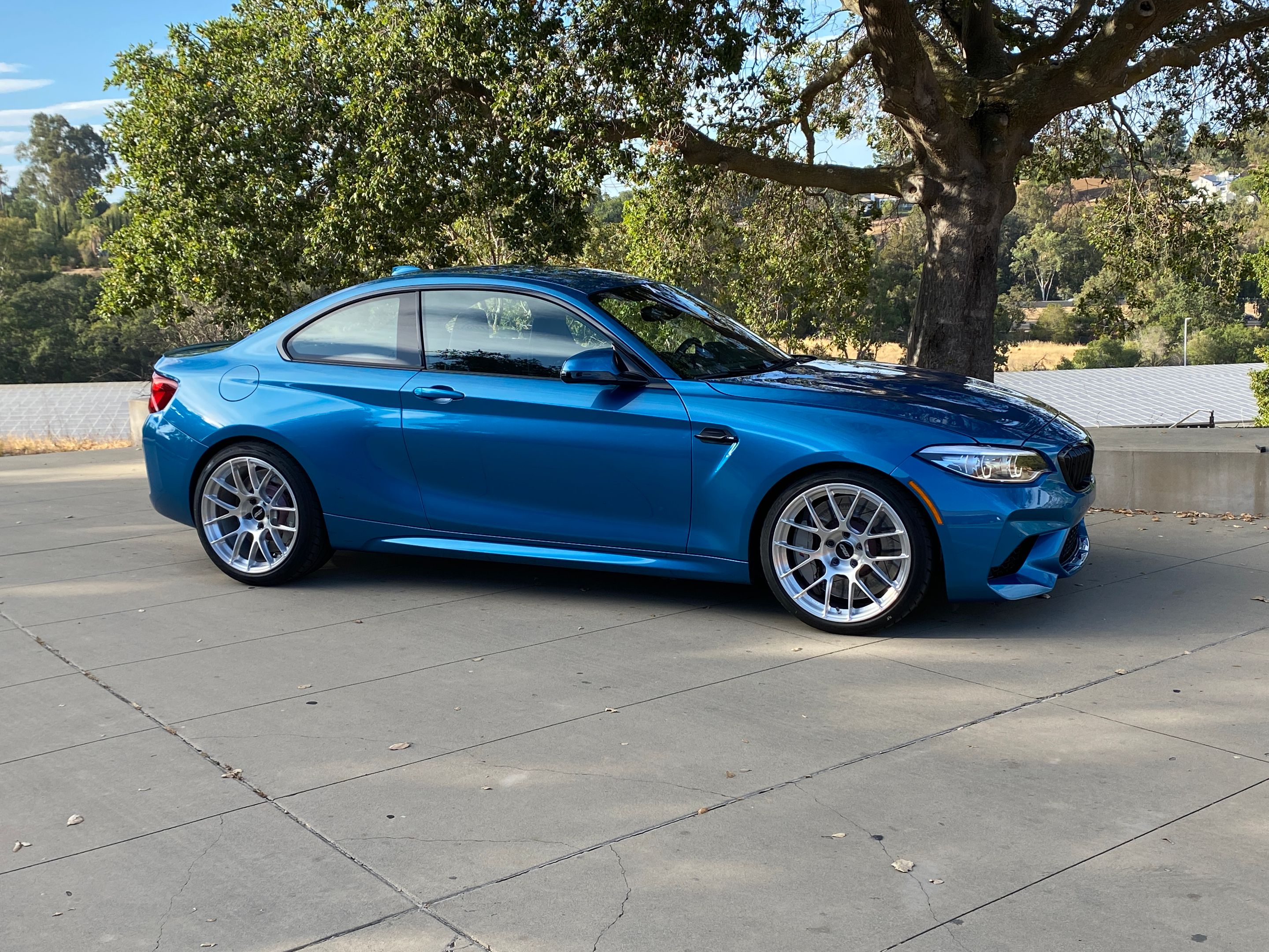 Blue BMW F87 M2 with 19" EC-7RS Apex wheels in Brushed Clear