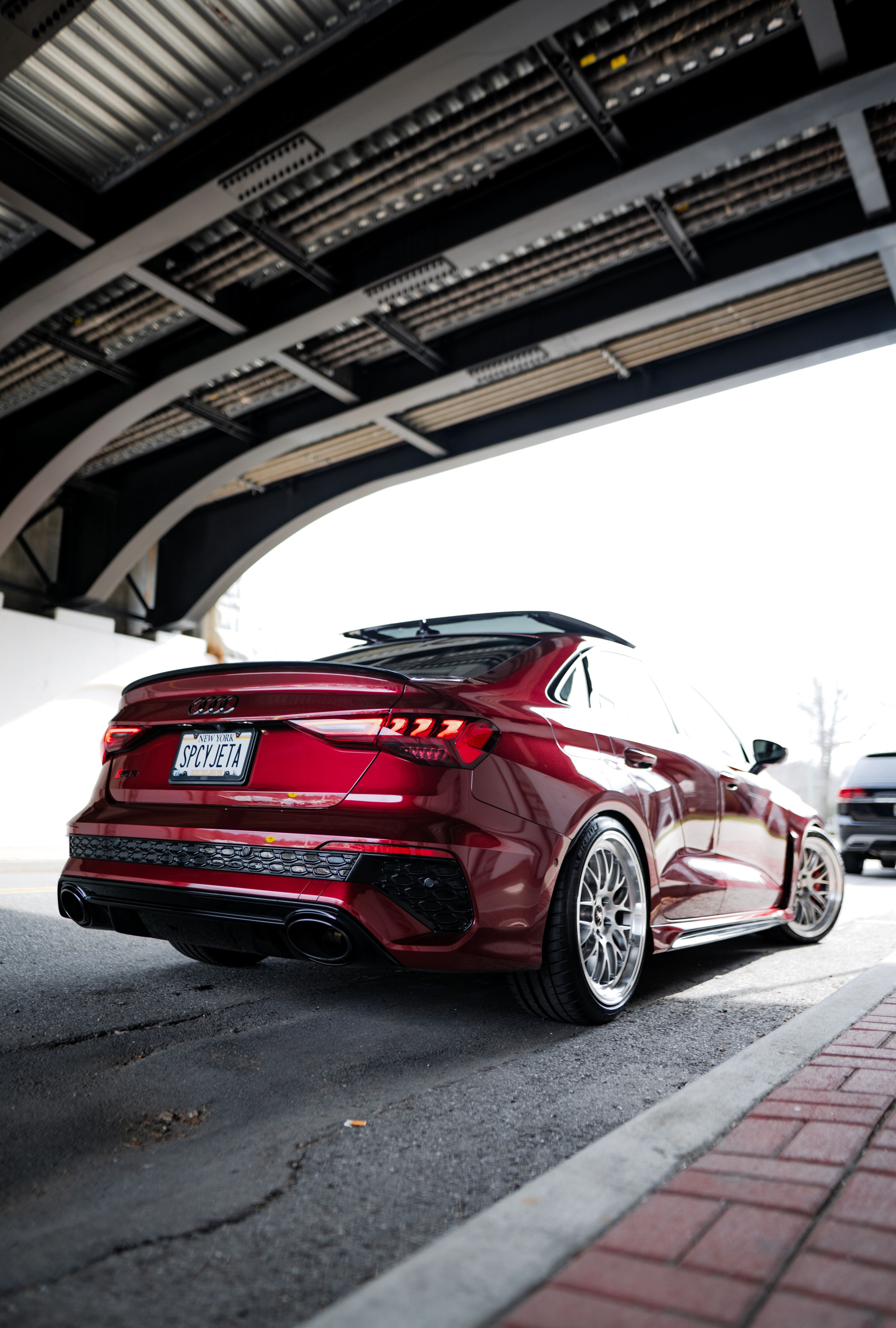 Red Audi 8Y RS 3 with 19" ML-10RT Apex wheels in Machined Lip Brushed Clear