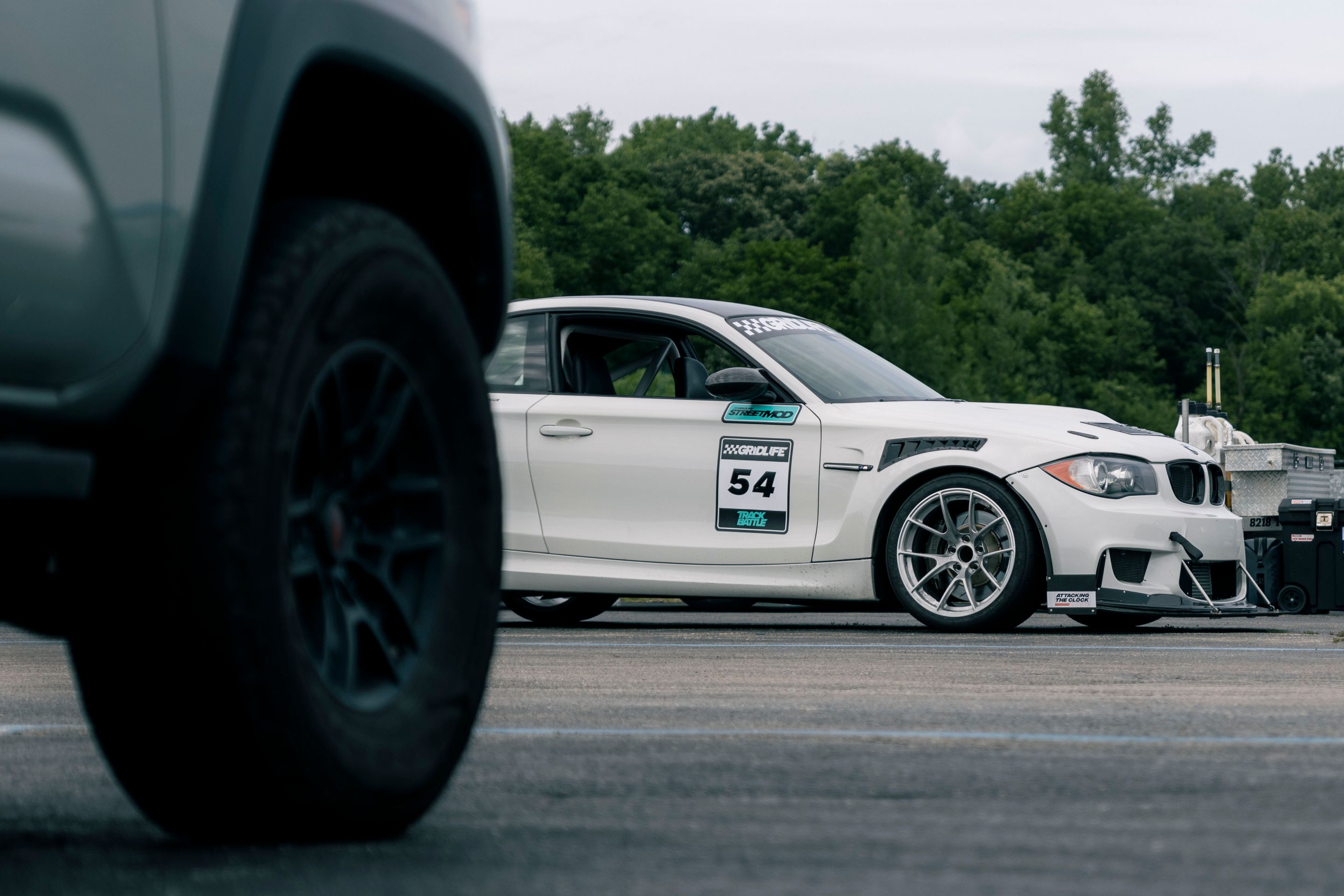 White BMW E82 1M with 18" VS-5RS Apex wheels in Brushed Clear