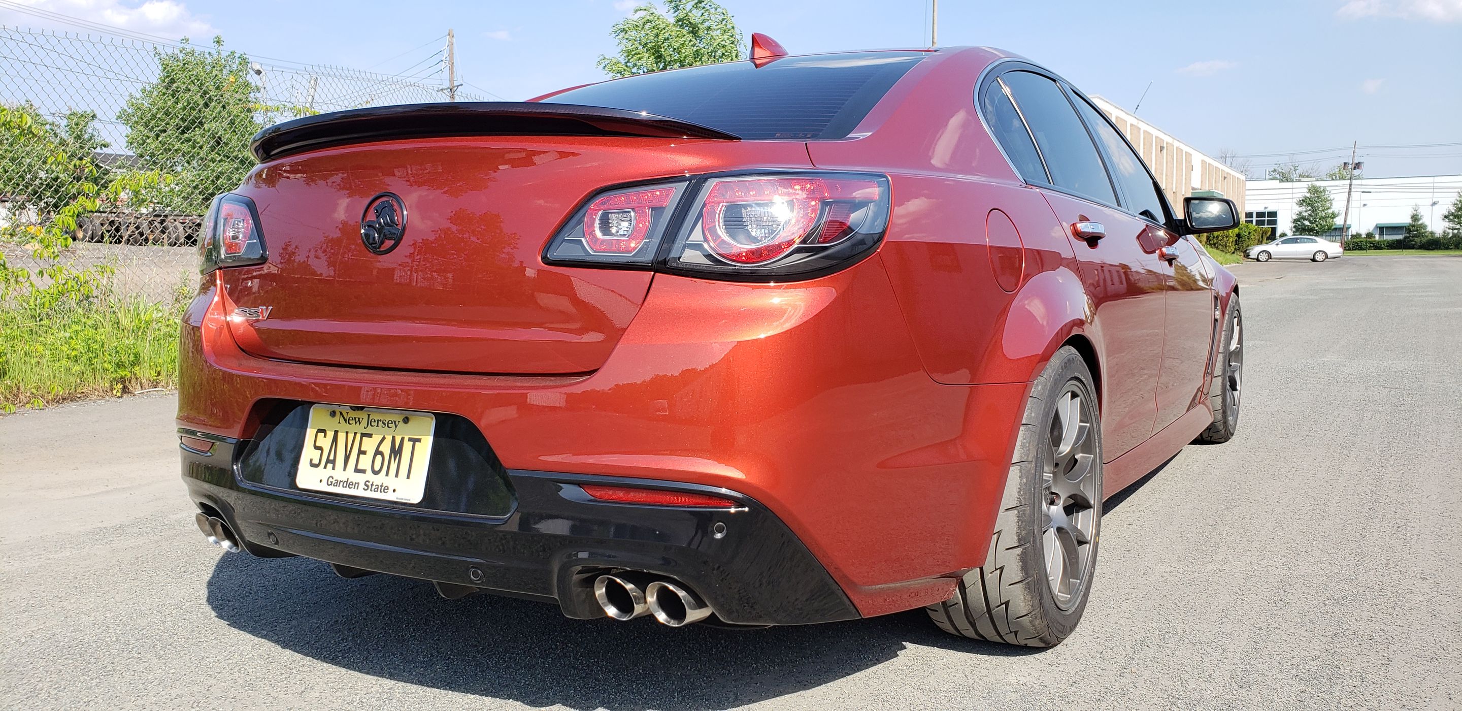 Orange Chevrolet SS with 18" EC-7 Apex wheels in Anthracite