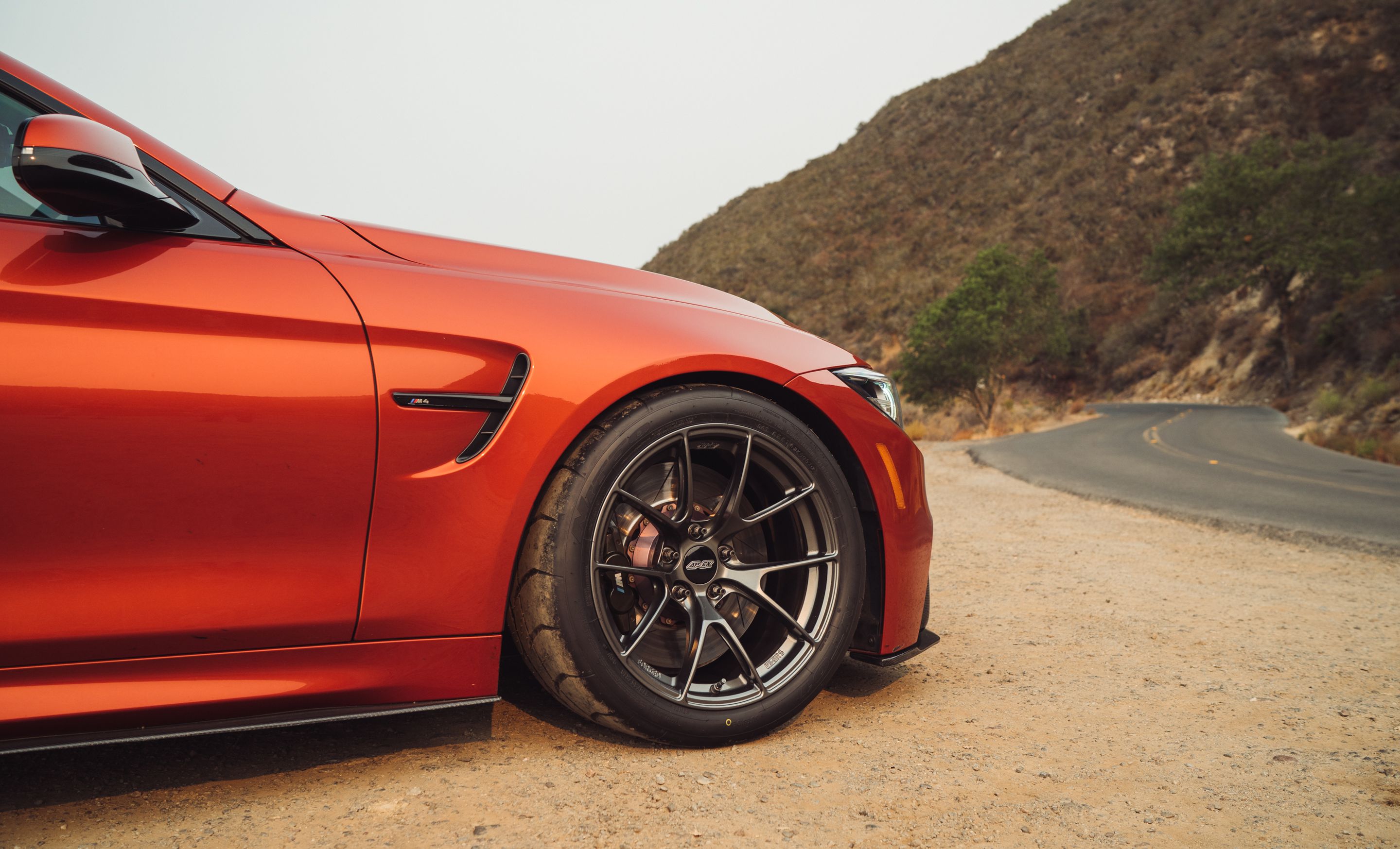 Orange BMW F82 Coupe M4 with 18" VS-5RS Apex wheels in Anthracite