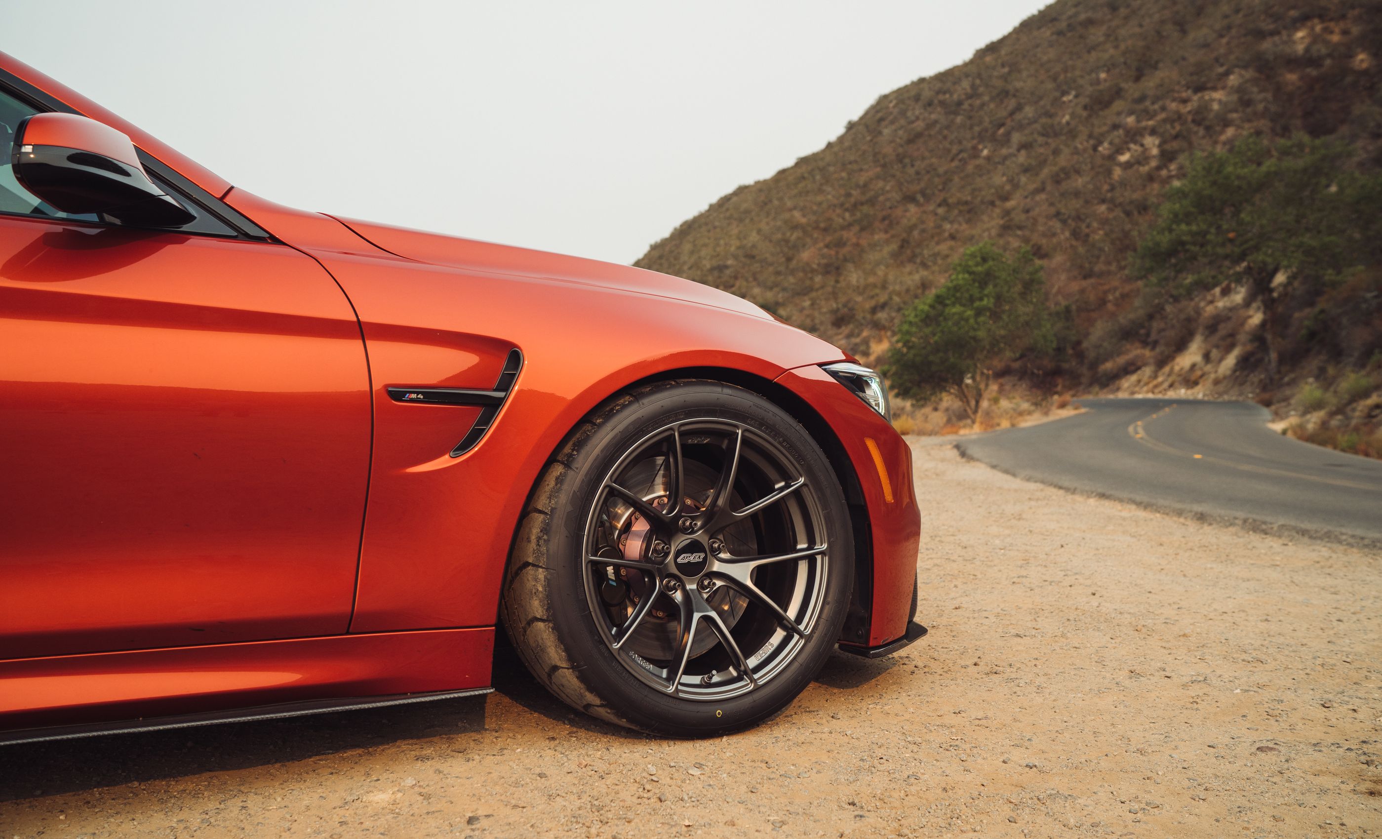 Orange BMW F82 Coupe M4 with 18" VS-5RS Apex wheels in Anthracite
