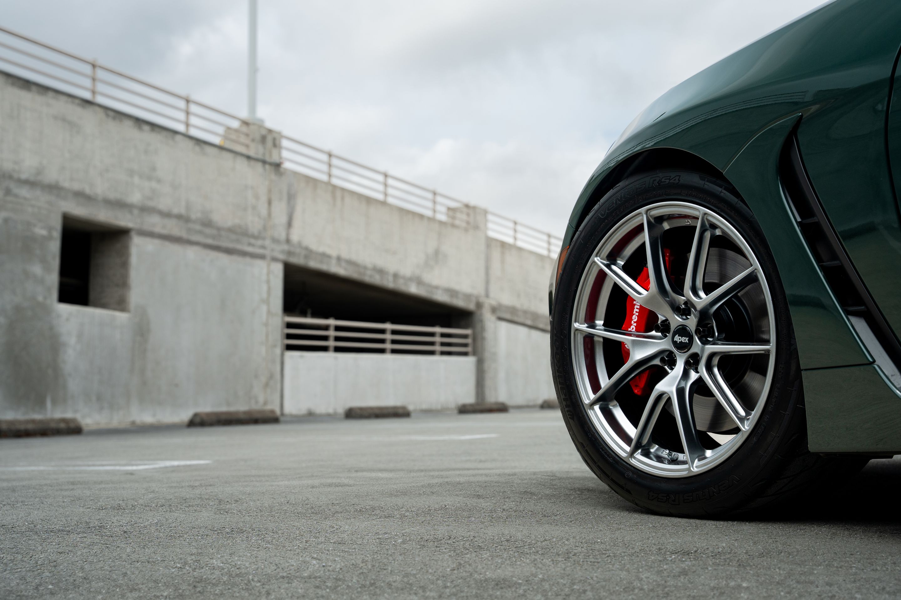 Green Toyota GR86 with 17" VS-5 Apex wheels in Hyper Black