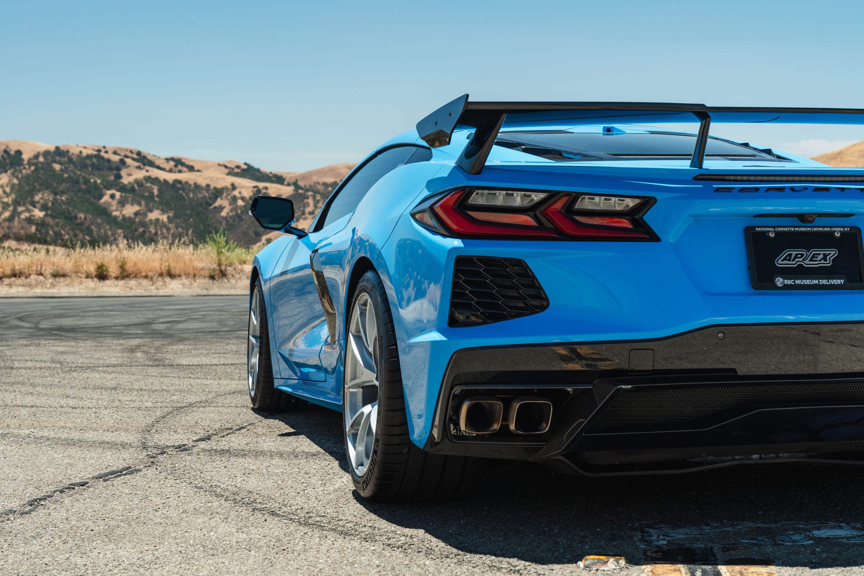 Blue Chevrolet C8 Corvette Stingray/Z51 with 19" VS-5RS Apex wheels in Brushed Clear