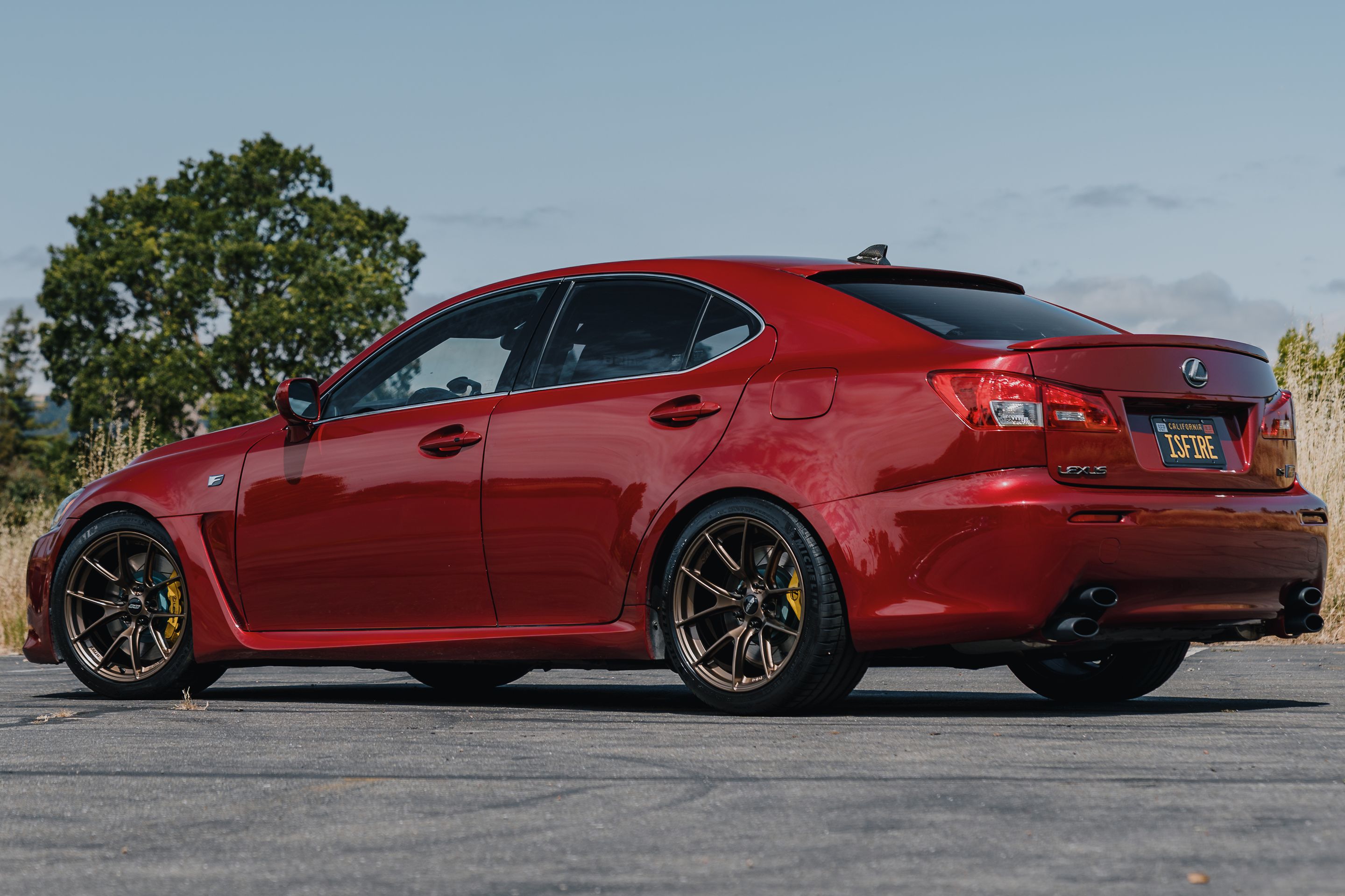Red Lexus USE20 IS-F with 18" VS-5RS Apex wheels in Satin Bronze