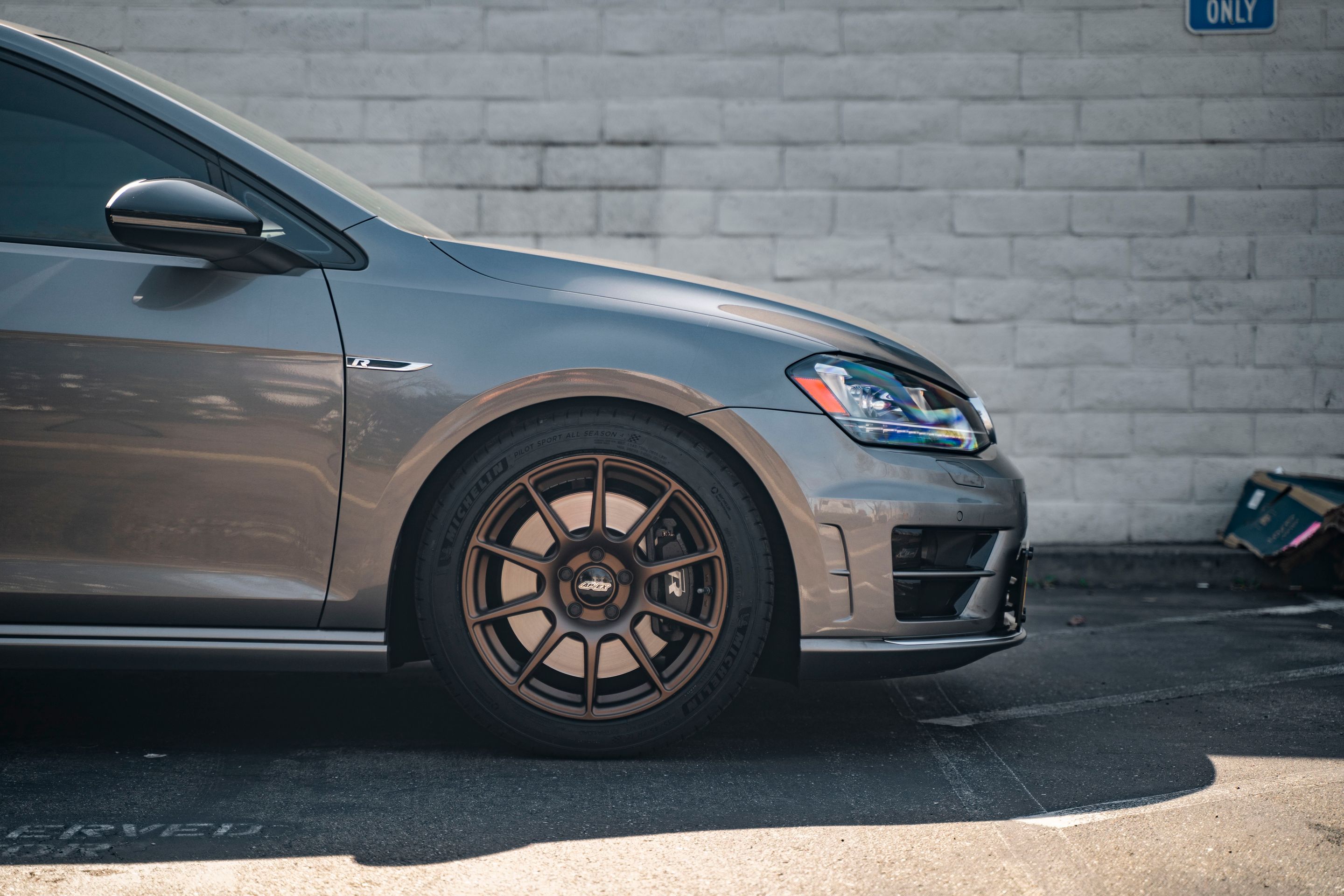 Grey VW MK7 Golf R with 17" SM-10 Apex wheels in Satin Bronze