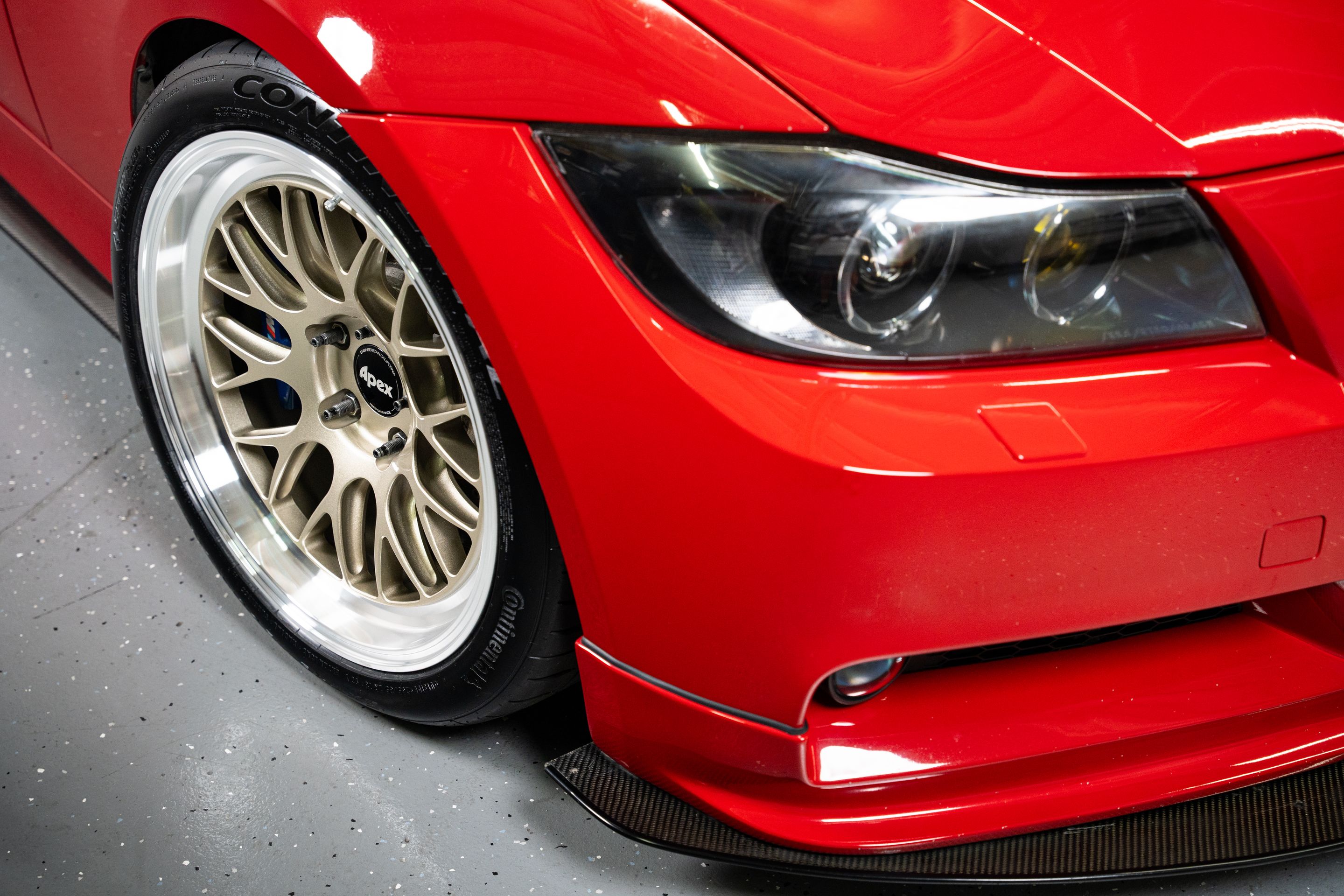 Red BMW E90 Sedan 3 Series with 18" ML-10RT Apex wheels in Machined Lip Gloss Motorsport Gold