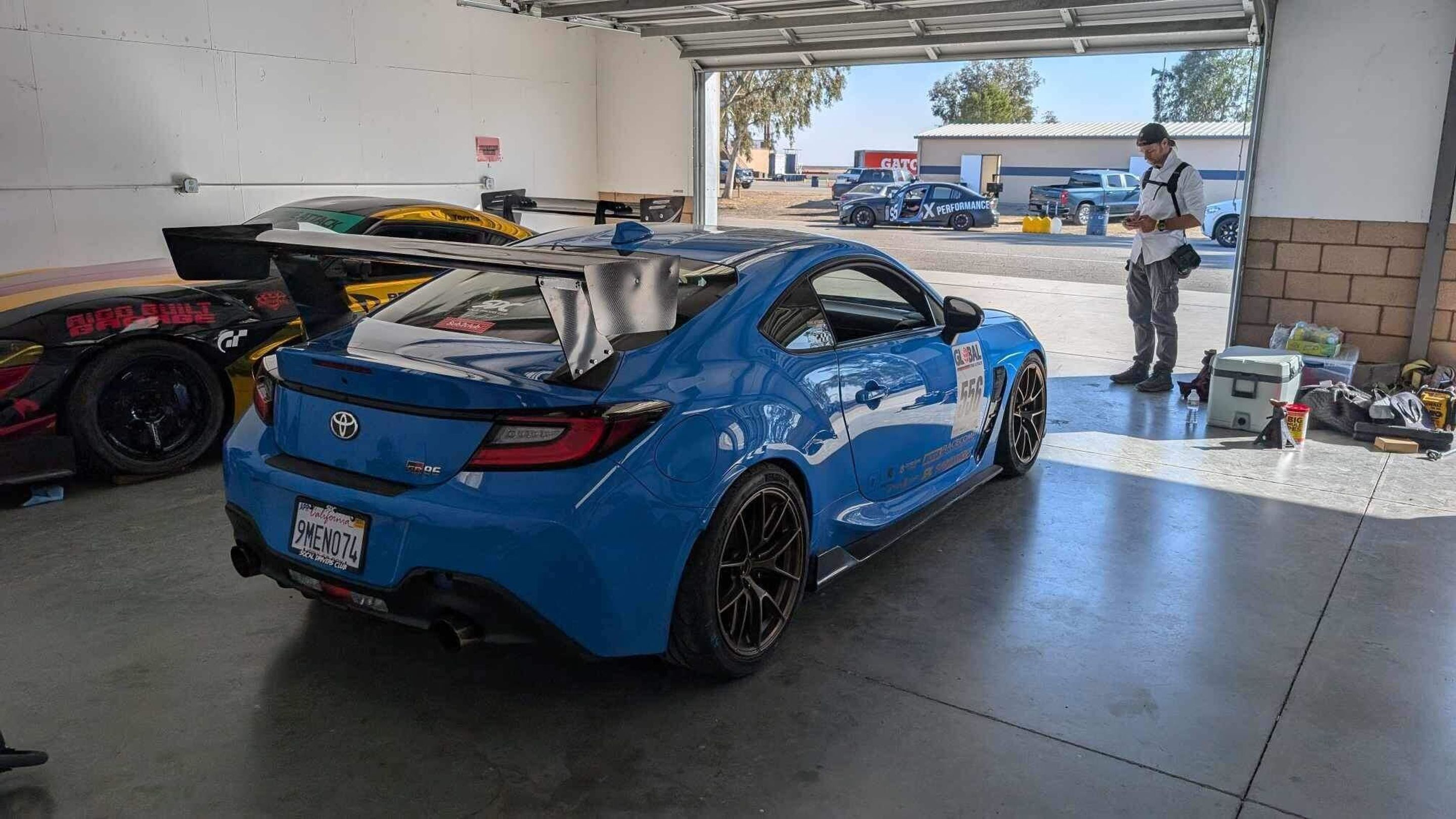 Blue Toyota GR86 with 18" VS-5RS Apex wheels in Satin Bronze