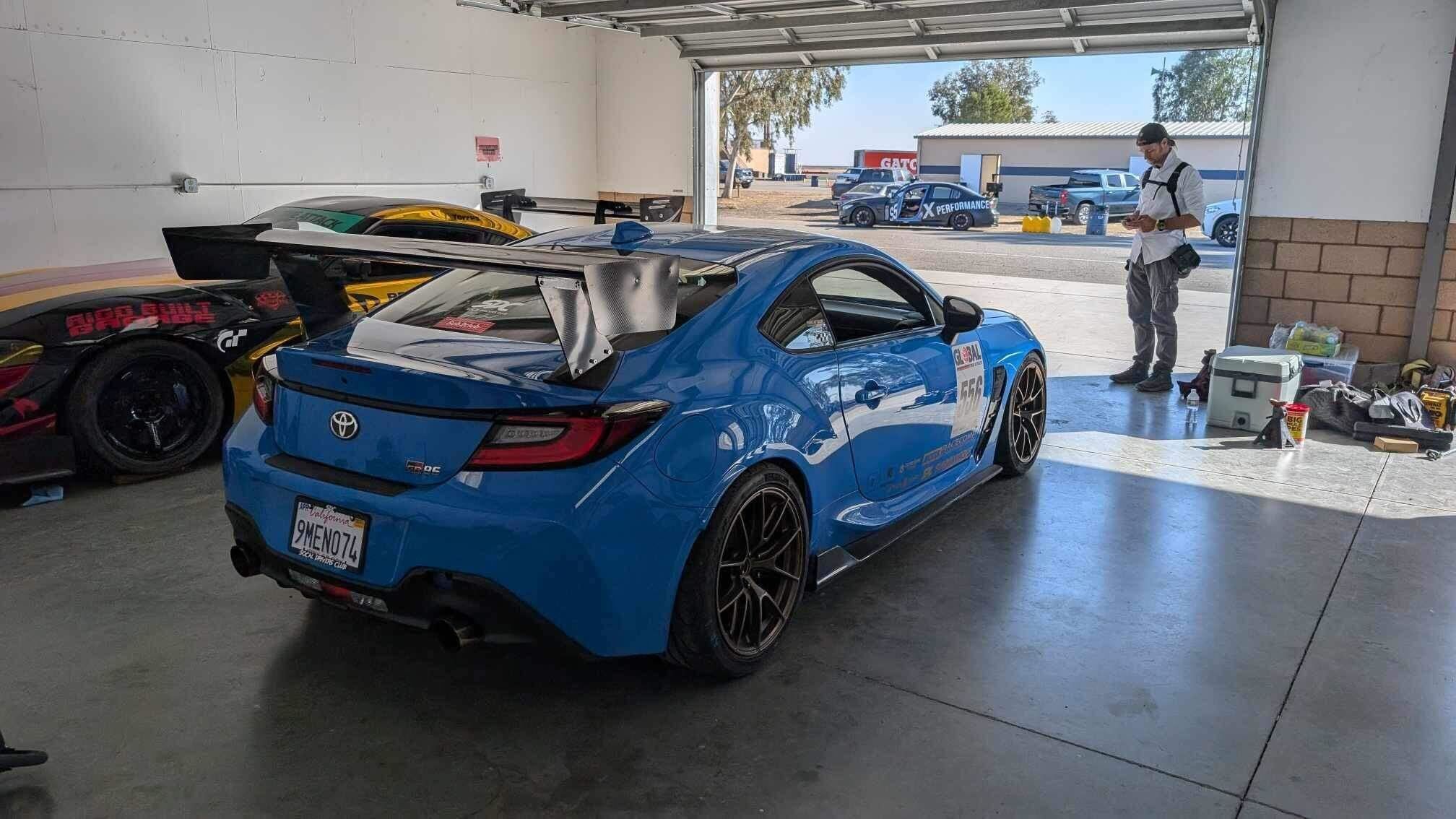 Blue Toyota GR86 with 18" VS-5RS Apex wheels in Satin Bronze