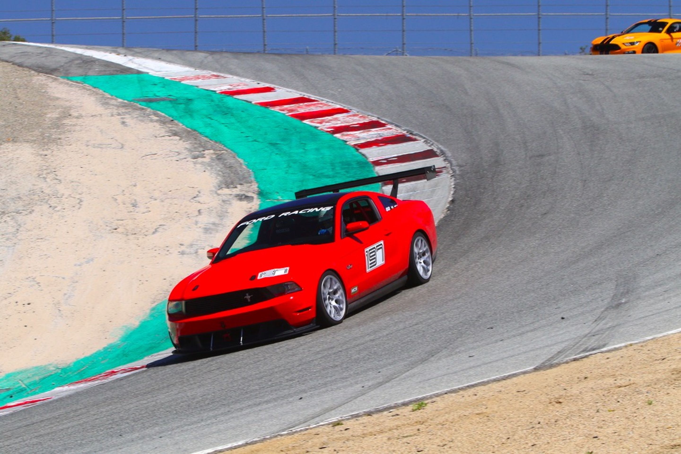 Red Ford S197 Mustang GT with 18" EC-7 Apex wheels in Race Silver