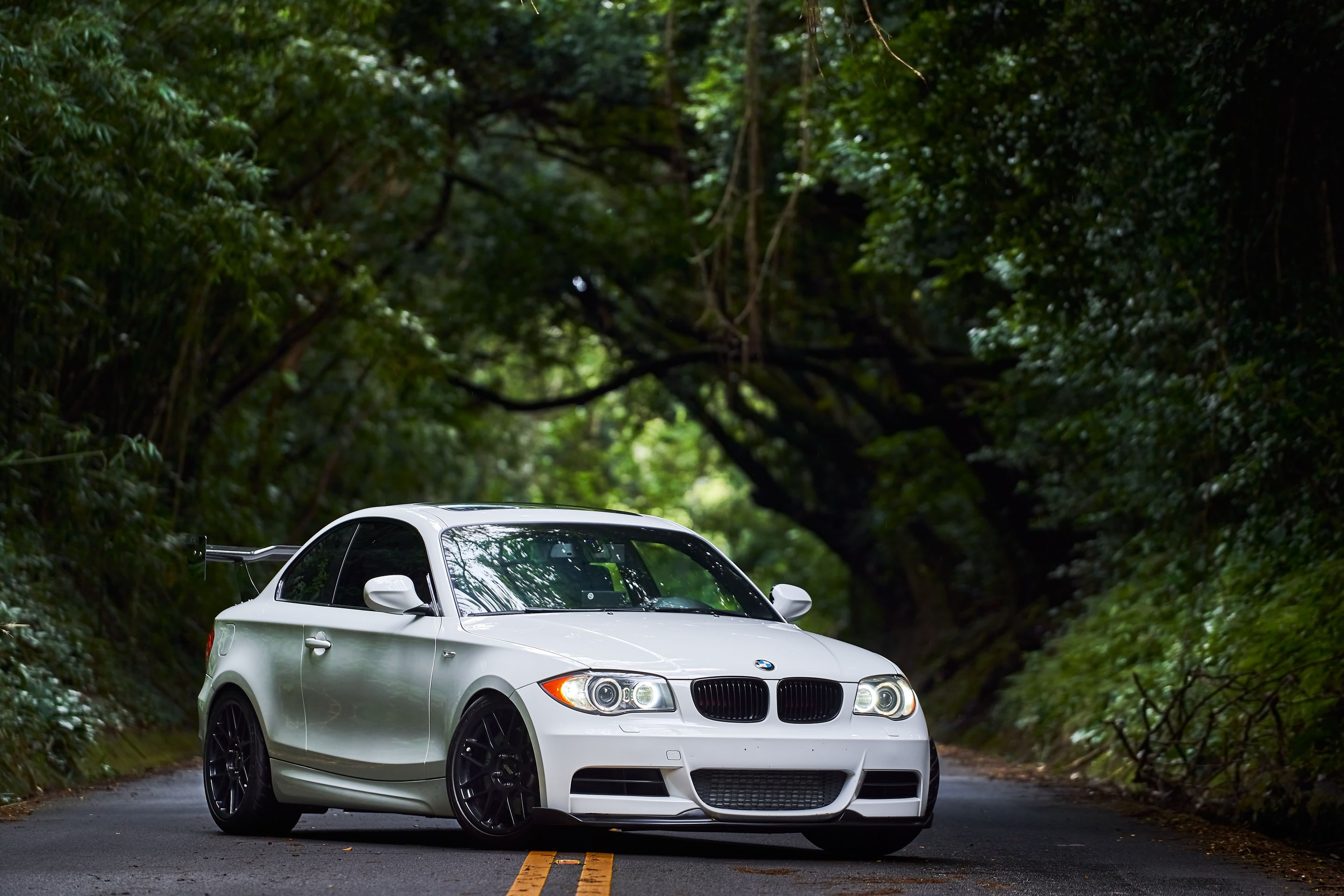 White BMW E82 Coupe 1 Series with 18" ARC-8 Apex wheels in Satin Black