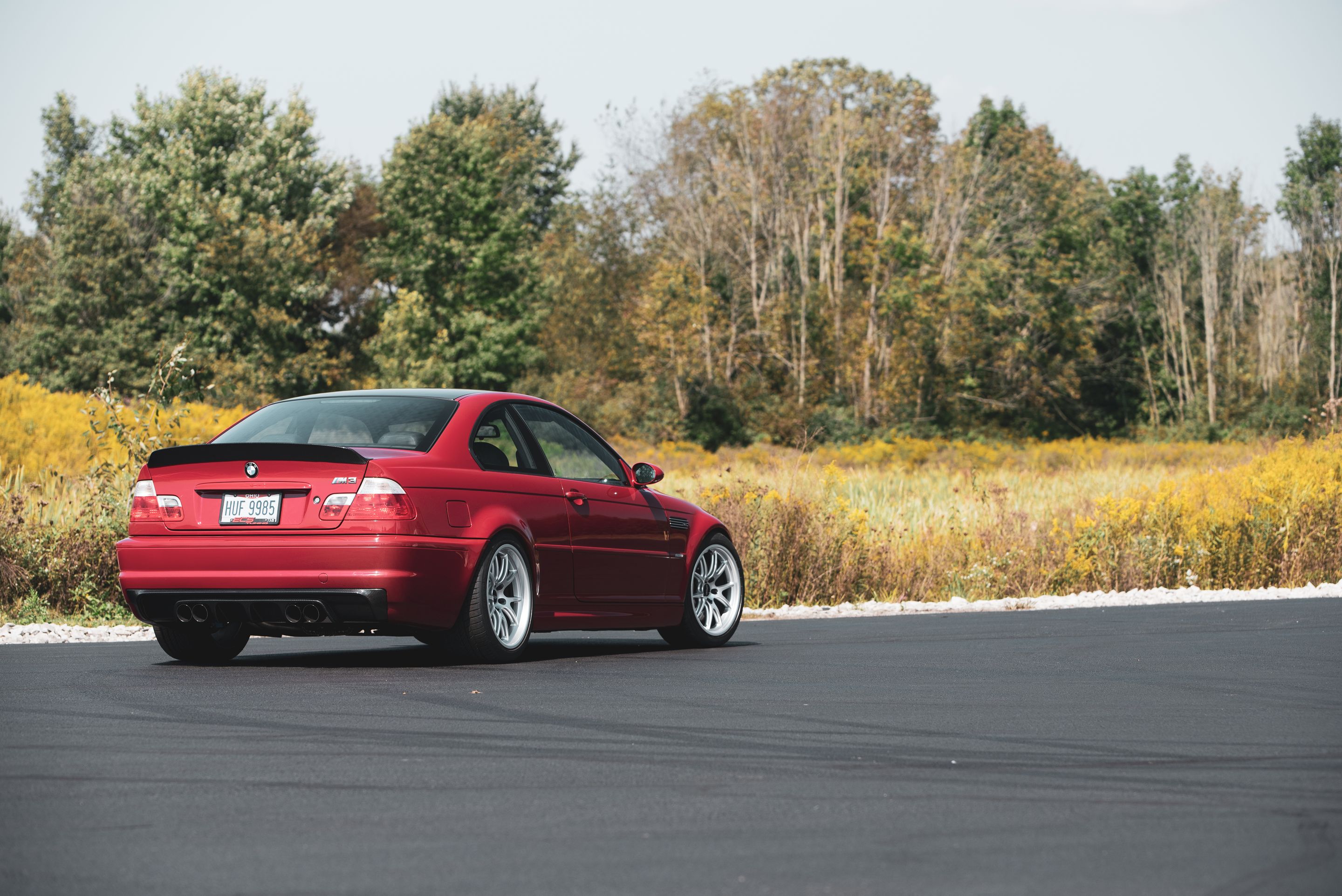 Red BMW E46 M3 with 18" FL-5 Apex wheels in Race Silver