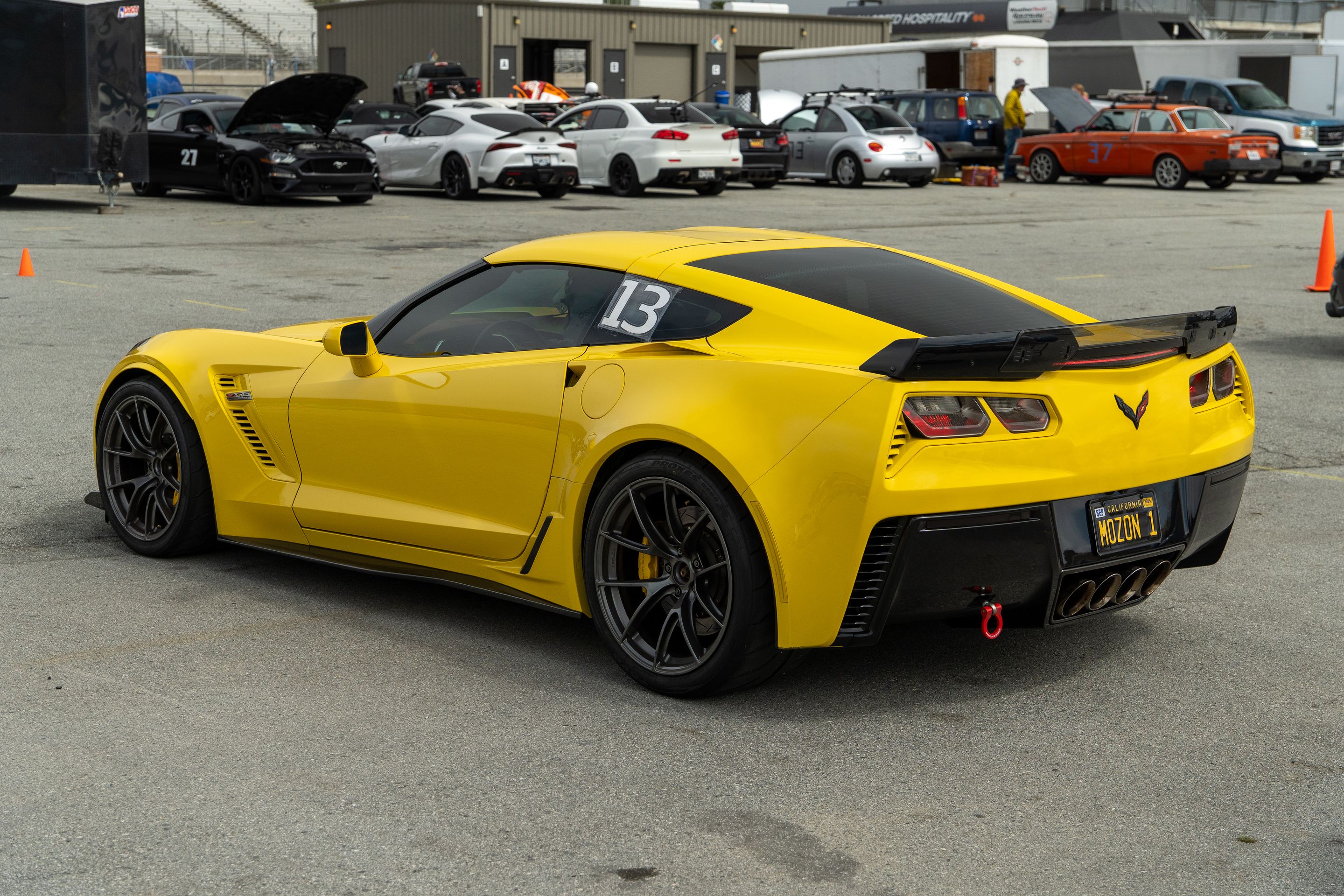 Yellow Chevrolet C7 Corvette Z06 with 19"/20" VS-5RS Apex wheels in Anthracite