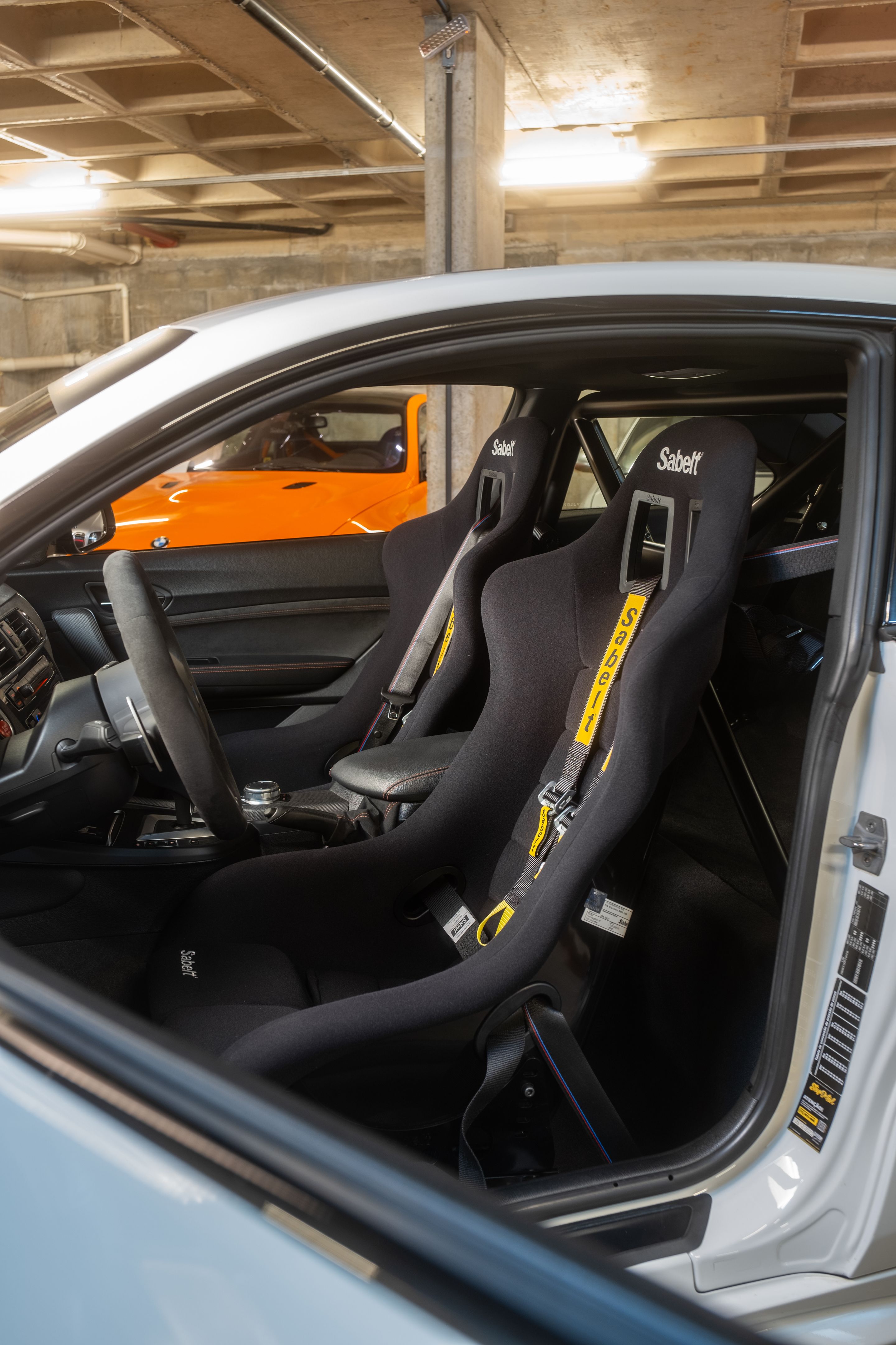 White BMW F87 M2 with 18" EC-7 Apex wheels in Satin Black