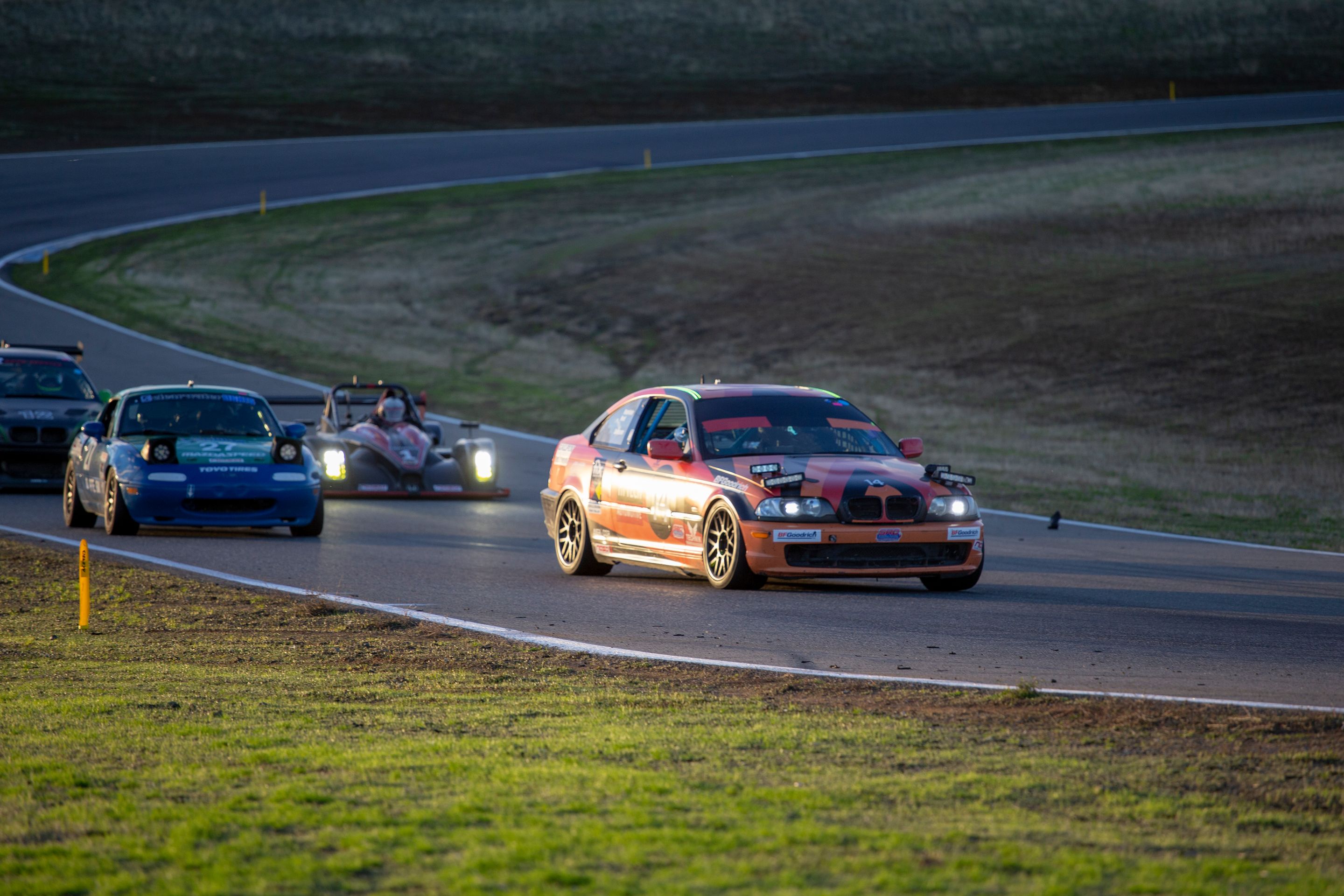 Orange BMW Spec E46 with 17" ARC-8 Apex wheels in Satin Black