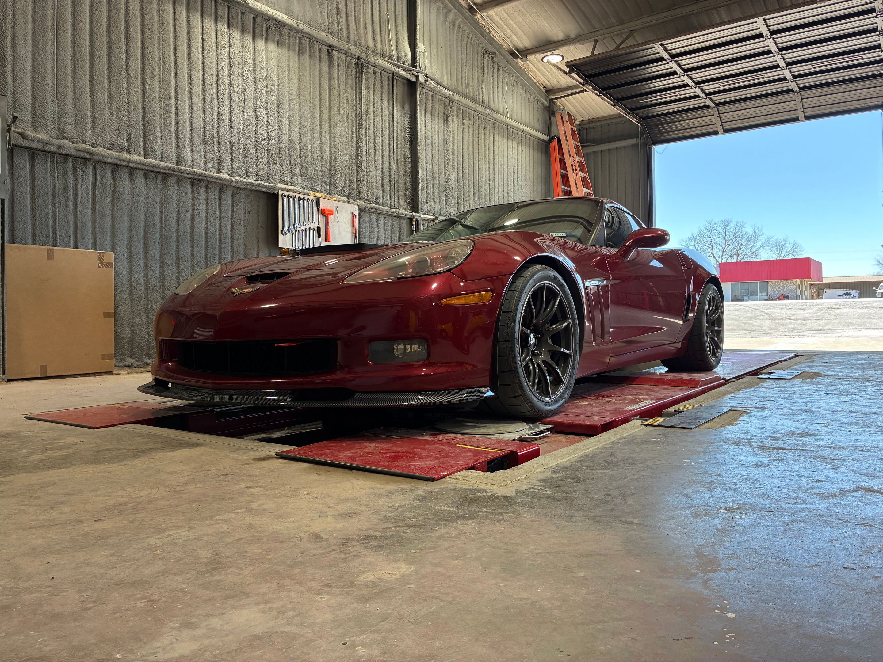 Red Chevrolet C6 Corvette Grand Sport with 18" SM-10 Apex wheels in Machined Lip Anthracite