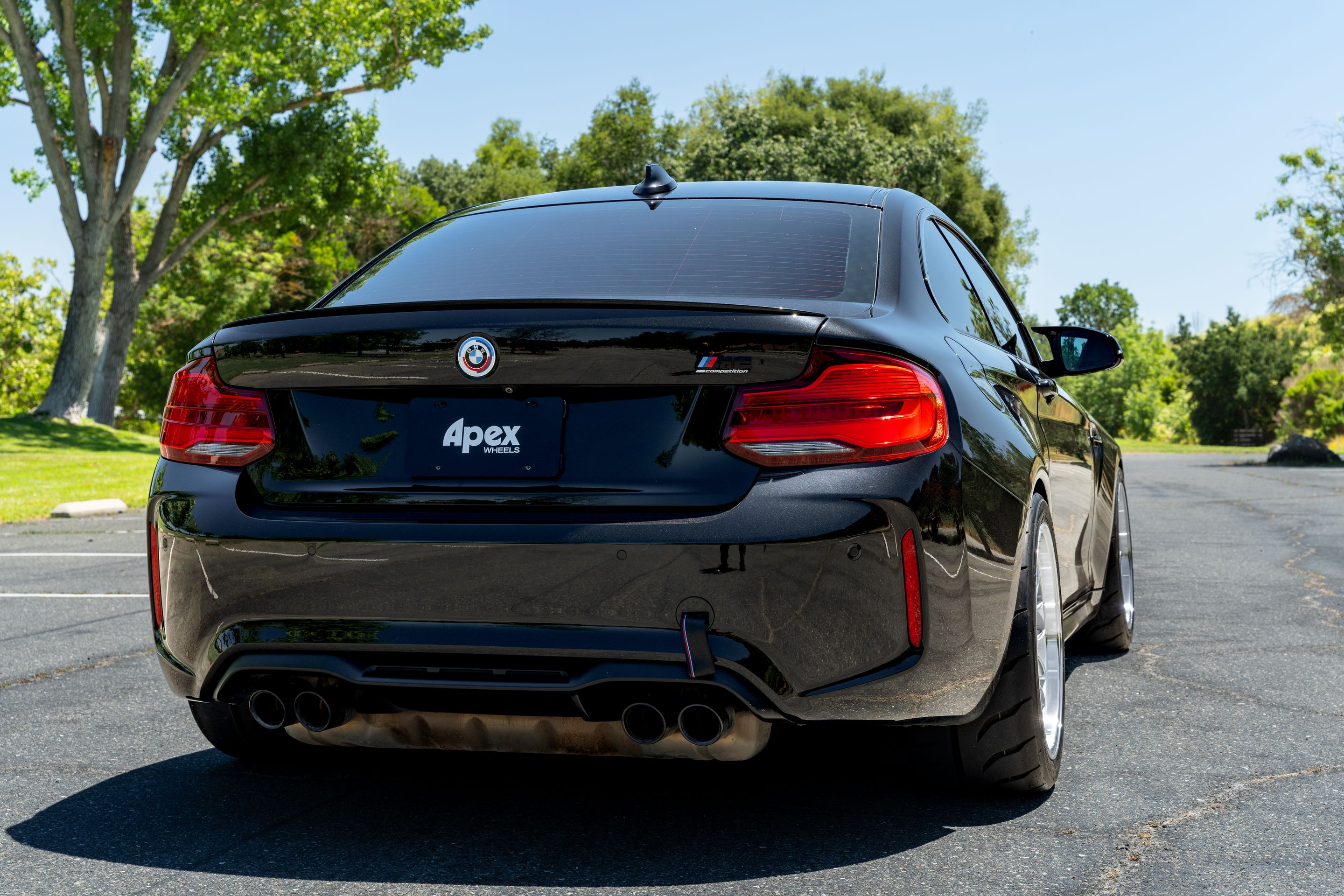 Black BMW F87 M2 with 18" ML-7RT Apex wheels in Machined Lip Race Silver