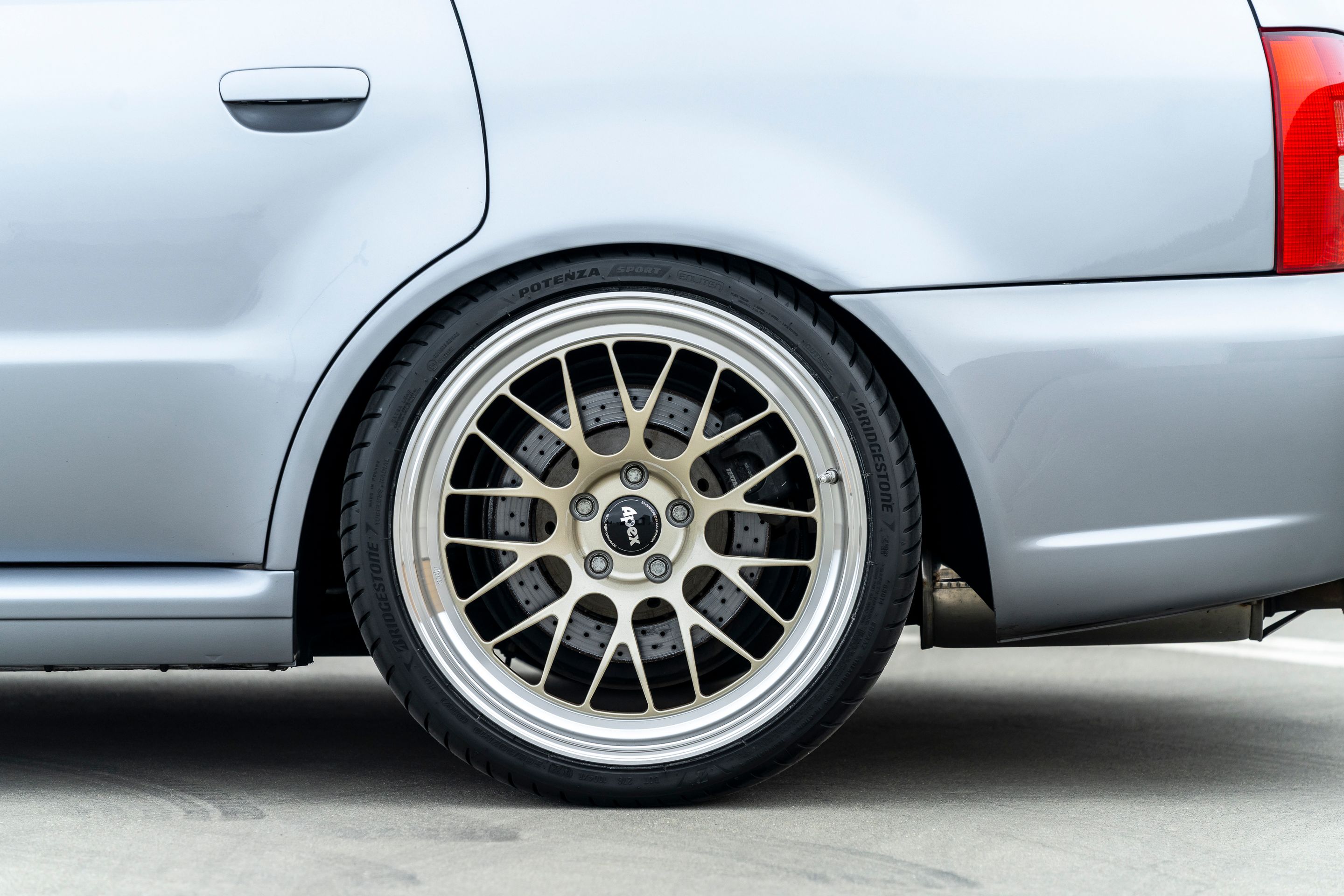 Silver Audi B5 RS 4 Avant/Wagon with 19" ML-10RT Apex wheels in Machined Lip Gloss Motorsport Gold