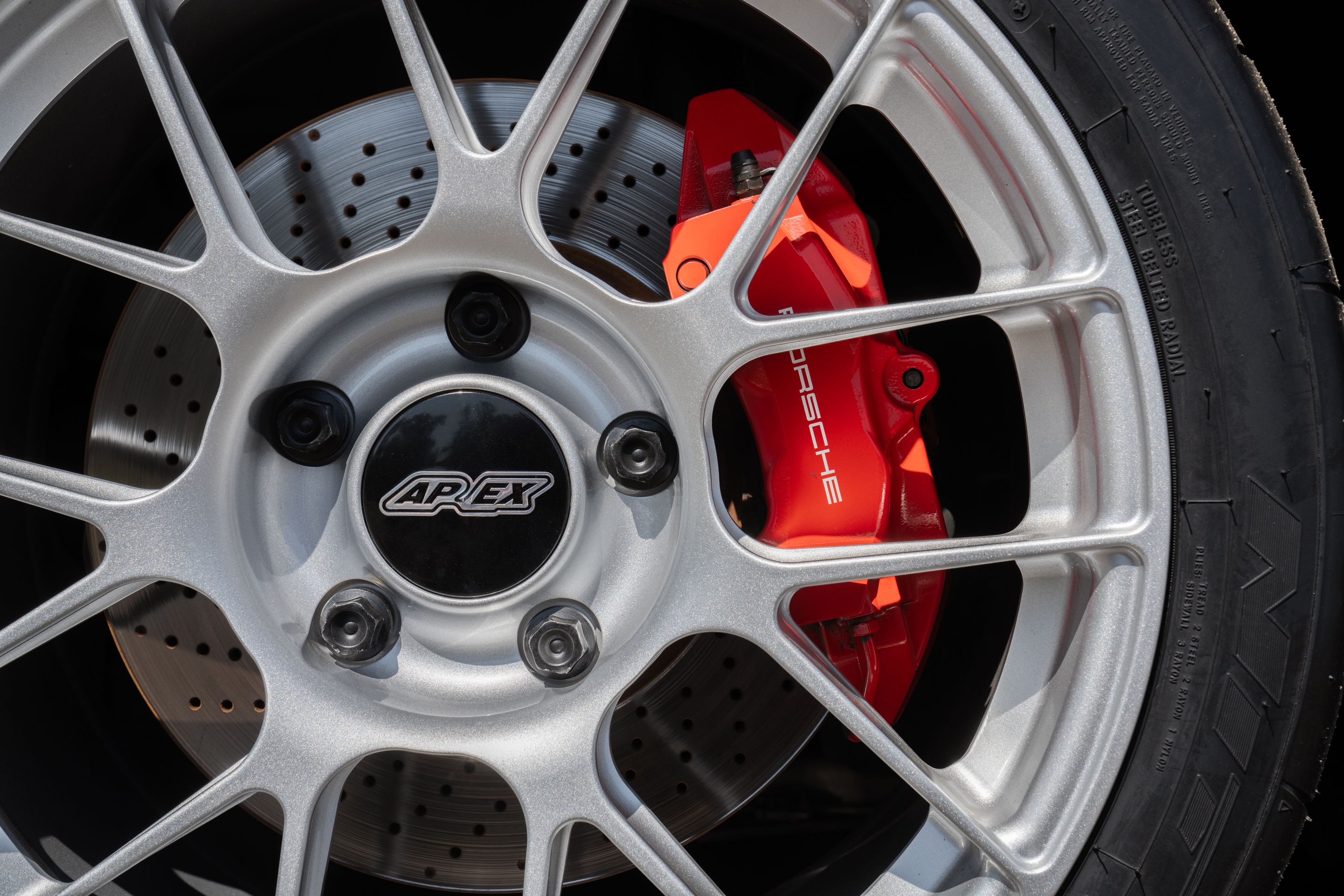 Black Porsche 911 997 Carrera 4S with 18" EC-7RS Apex wheels in Race Silver