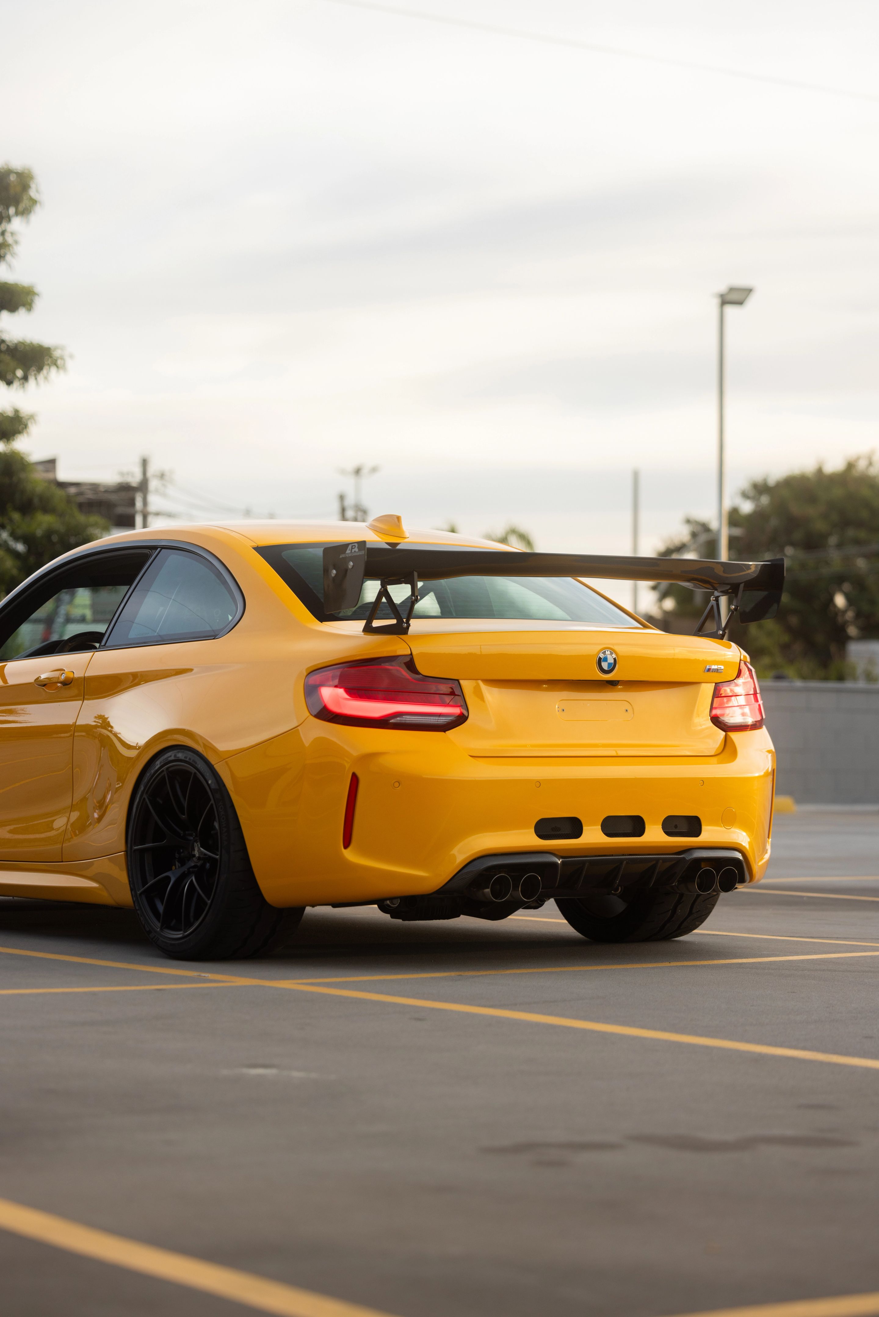 Yellow BMW F87 M2 with 19" VS-5RS Apex wheels in Satin Black