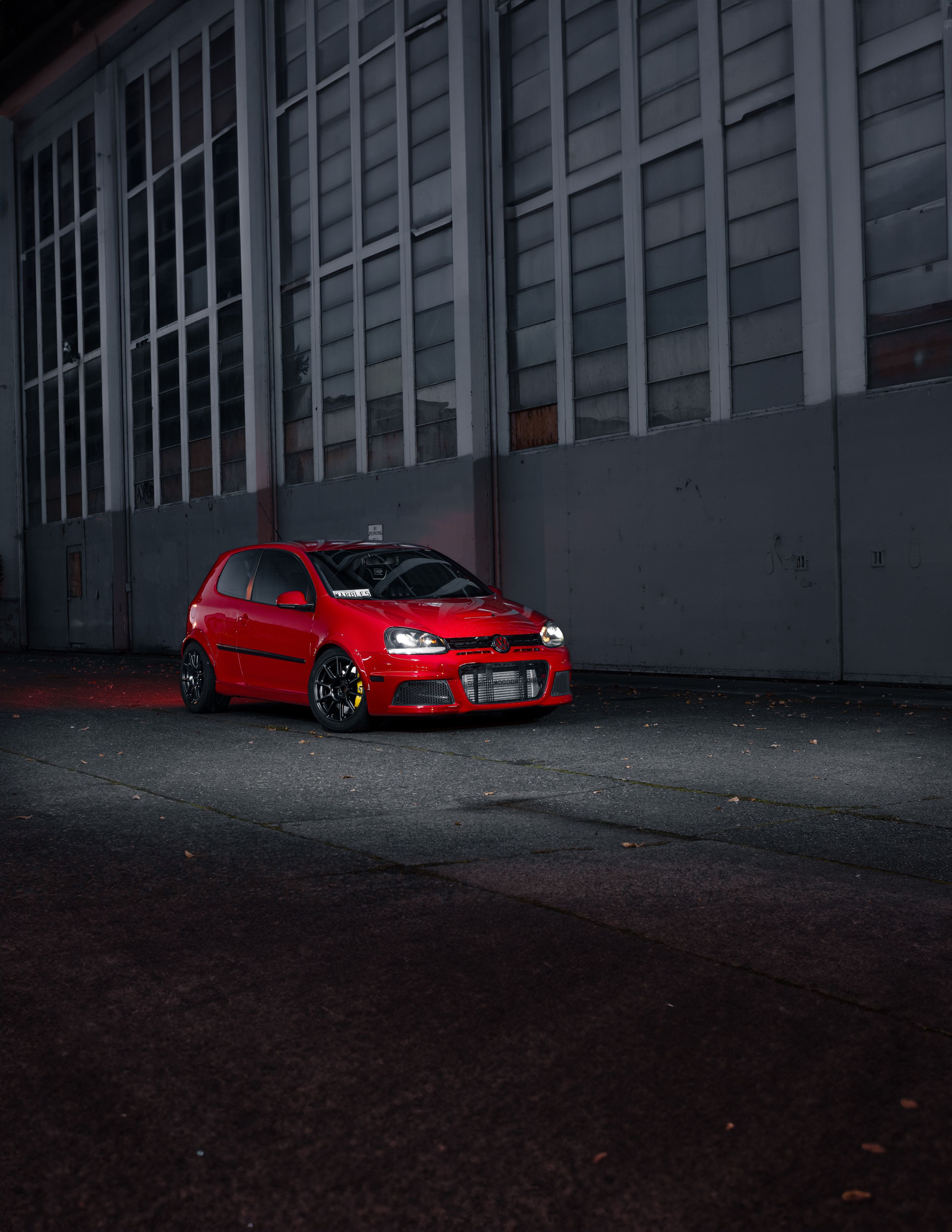 Red VW MK5 Golf with 17" SM-10 Apex wheels in Satin Black