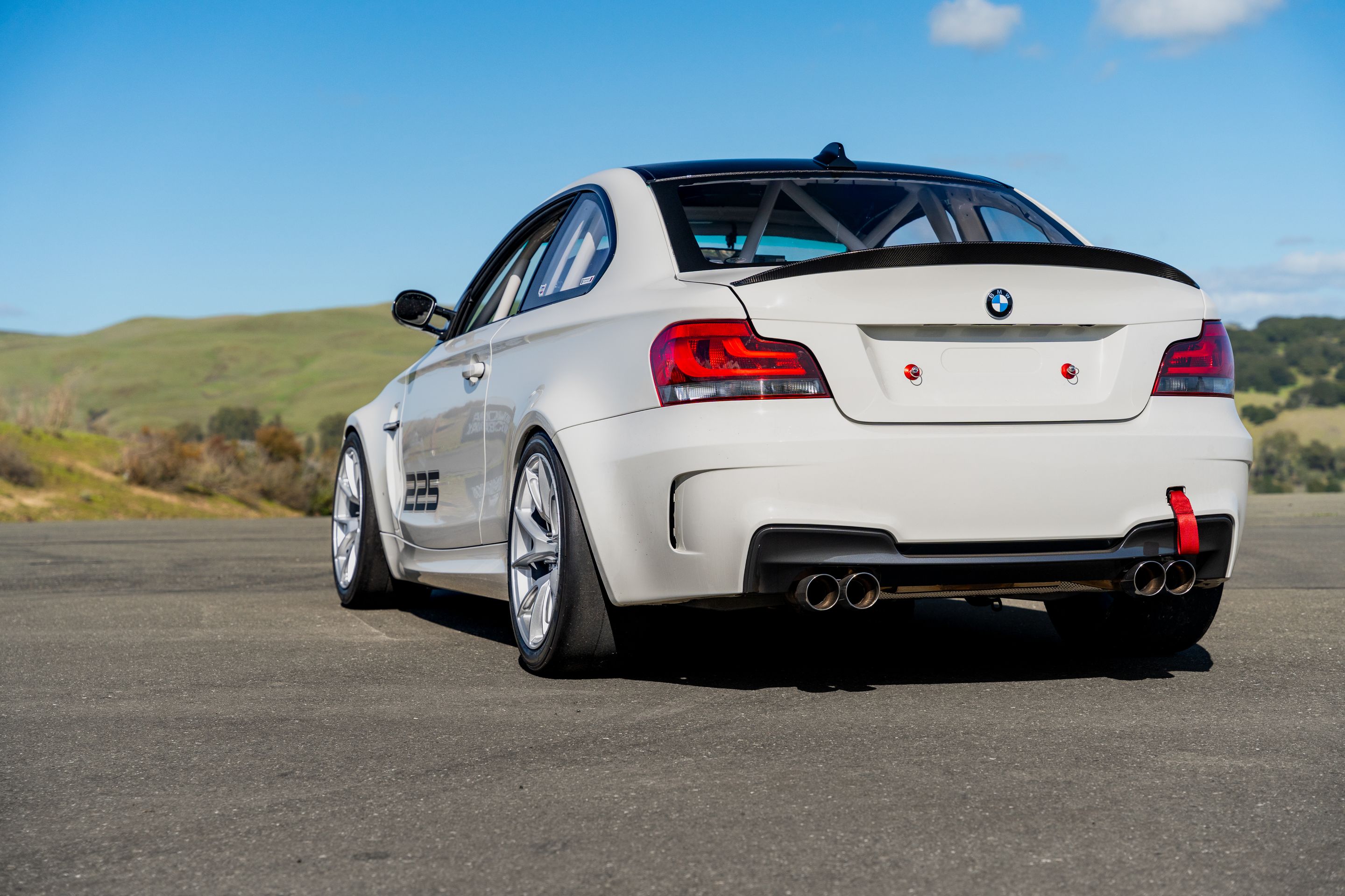 White BMW E82 1M with 18" VS-5 Apex wheels in Race Silver