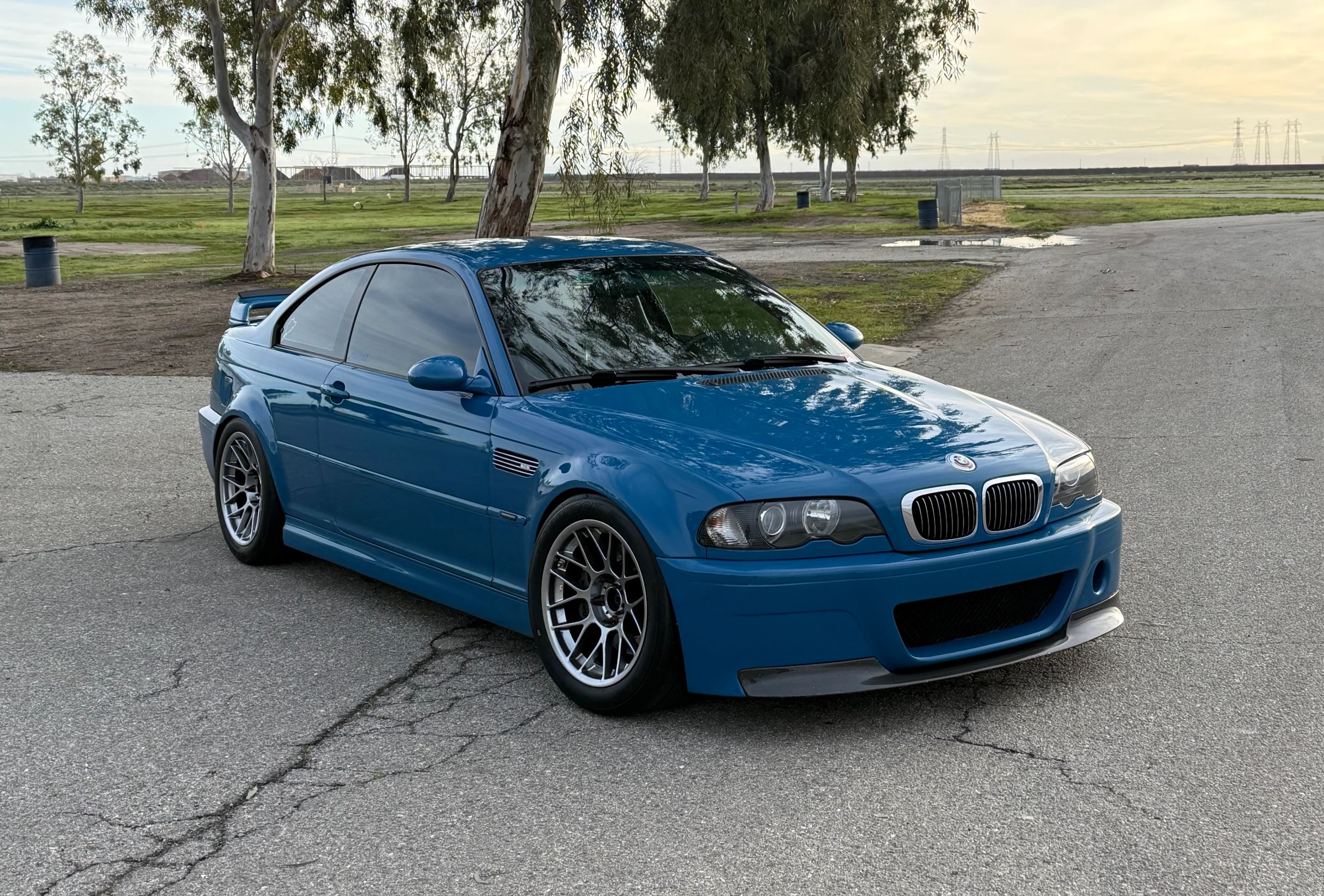 Blue BMW E46 M3 with 17" ARC-8 Apex wheels in Hyper Black